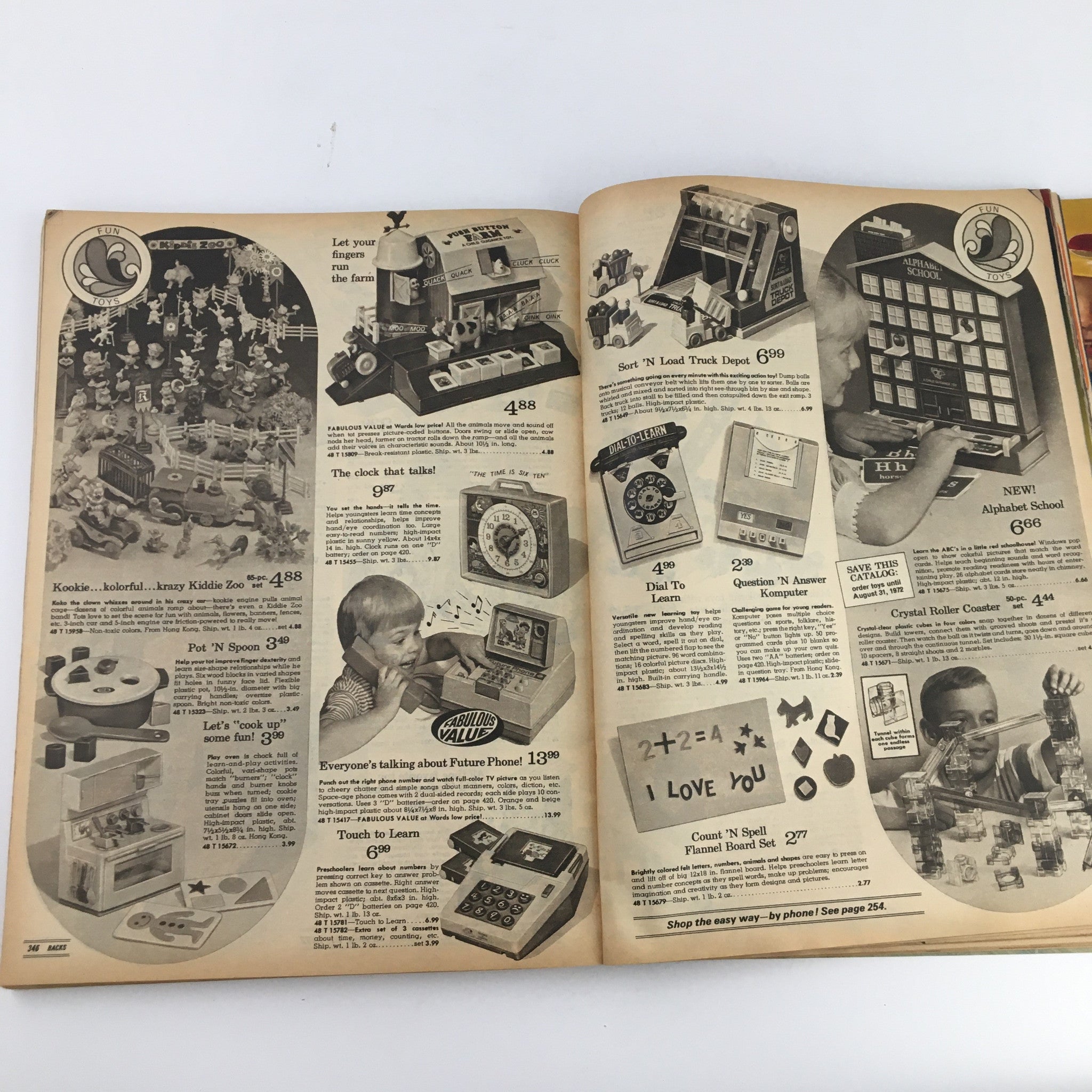 1971 Montgomery Ward Raggedy Dolls Christmas Price Guide Catalog page featuring educational toys such as the Alphabet School, Crystal Roller Counter, and various children's games.