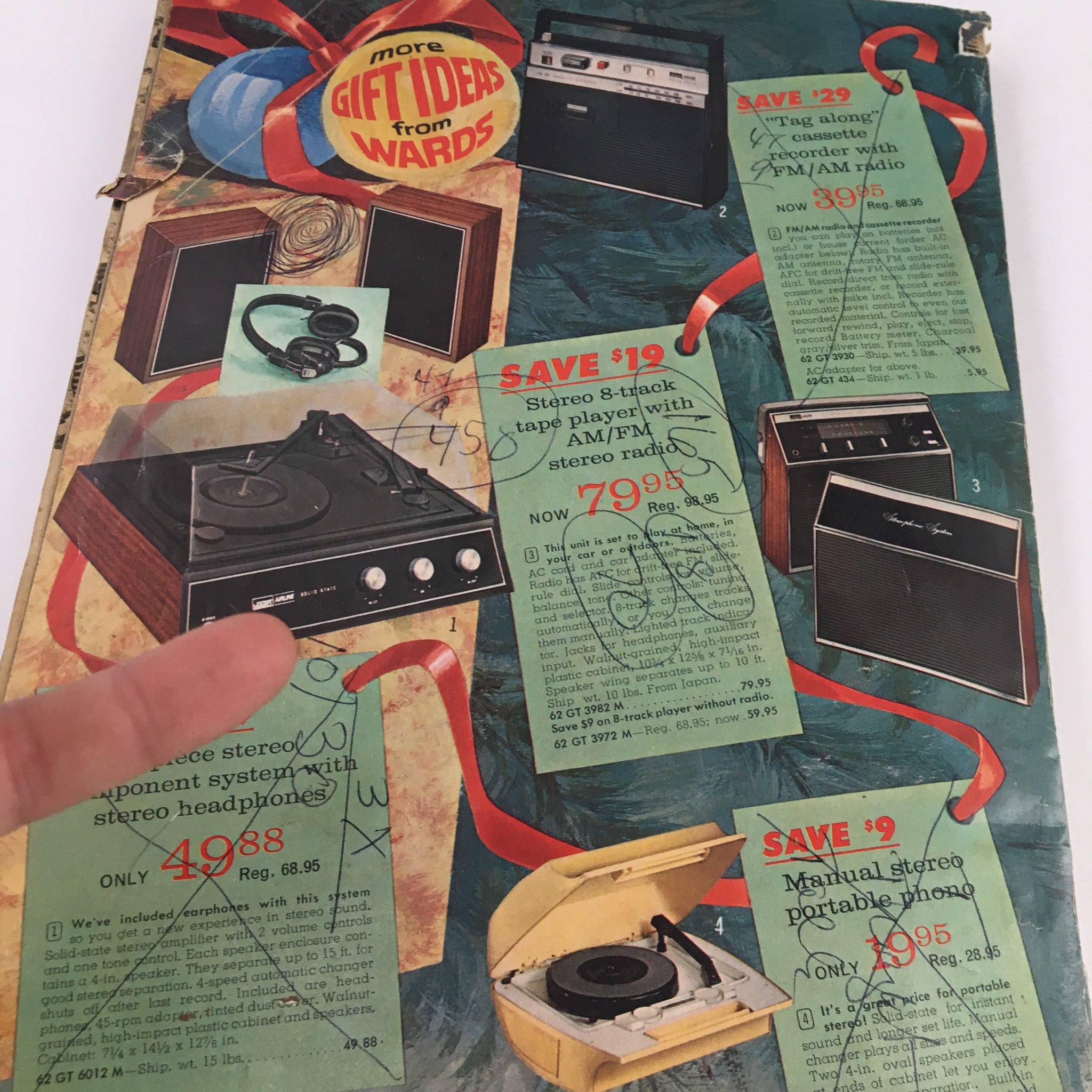 1971 Montgomery Ward Raggedy Dolls Christmas Price Guide Catalog back cover close-up showcasing discounts on audio equipment, including a stereo component system and 8-track player.