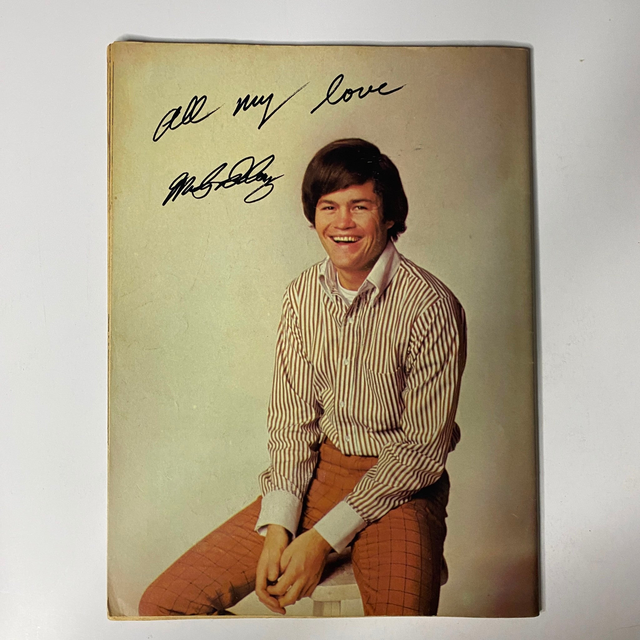 Cover of Tiger Beat's Official July 1967 #3 Monkee Spectacular featuring a smiling young man in a striped shirt, with the handwritten message 'All my love' and his signature.