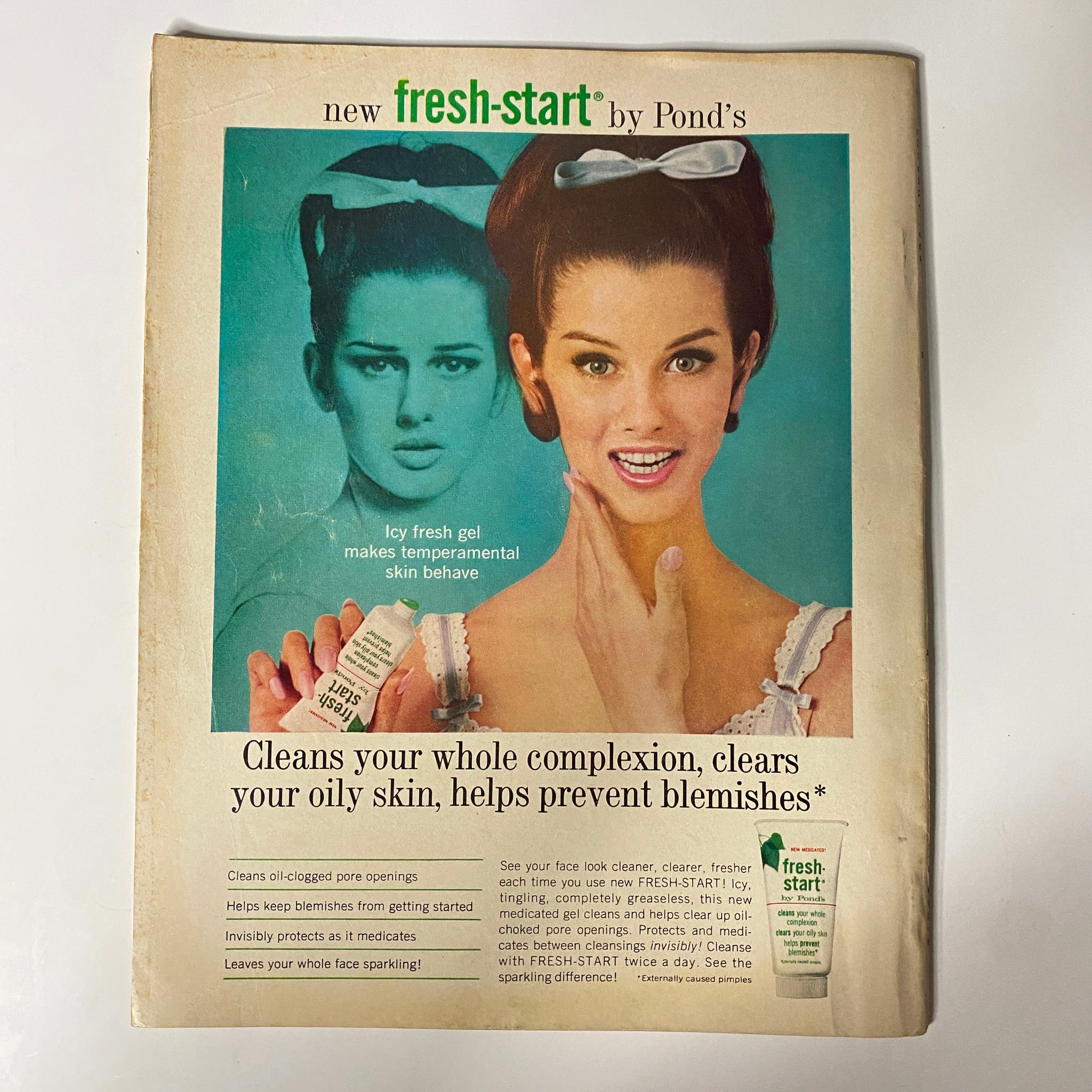 Advertisement for Pond's 'Fresh Start' skin care product from January 1965, featuring a model showcasing the product with the tagline 'Cleans your whole complexion, clears your oily skin, helps prevent blemishes', illustrating 1960s beauty trends.
