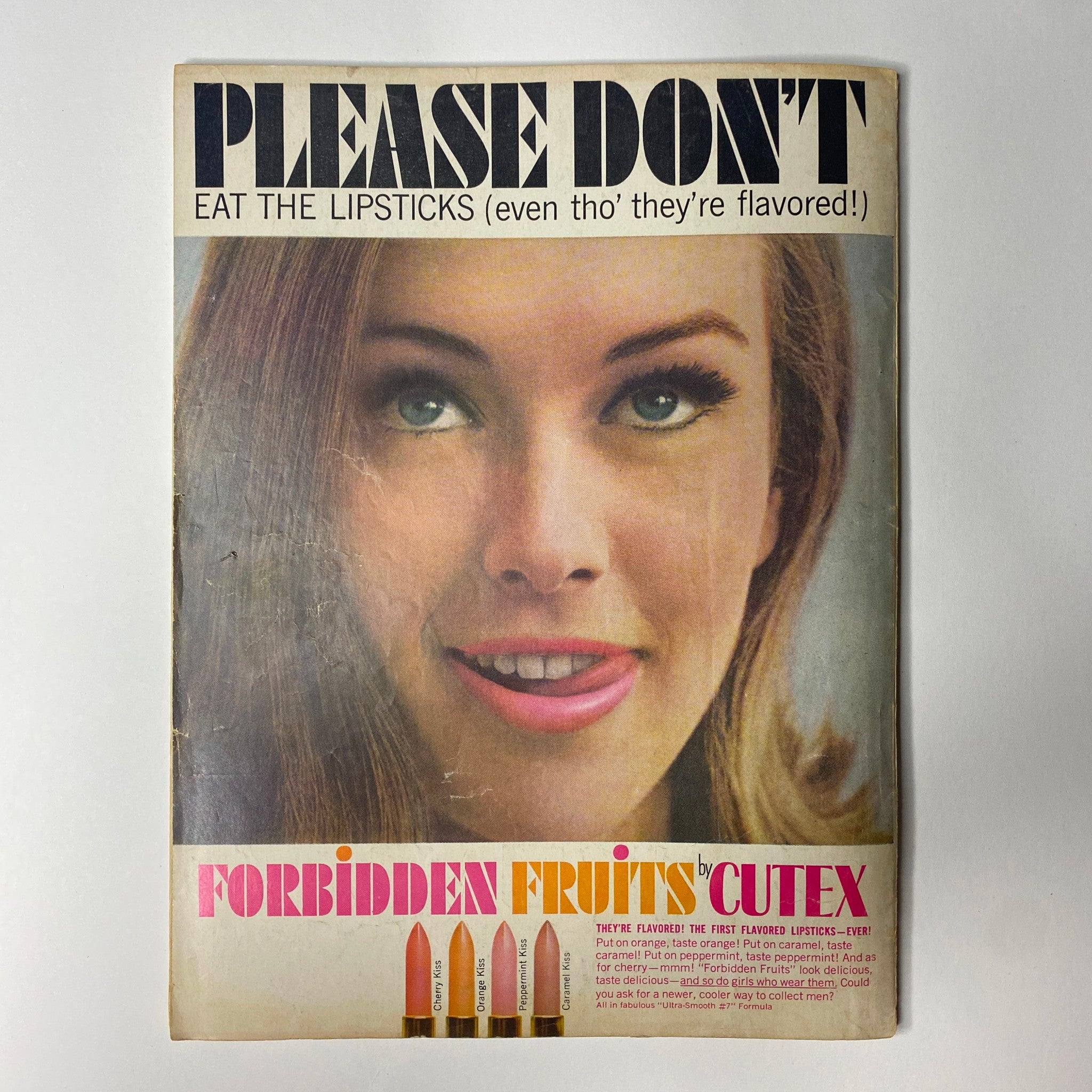 Advertisement page for Cutex's flavored lipsticks in Movie Stars Magazine August 1964 with a model posing and smiling.