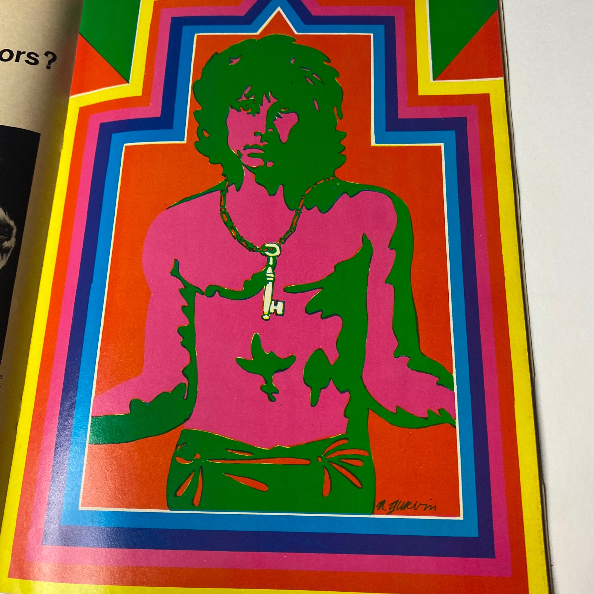 Colorful psychedelic poster of Jim Morrison featured in Hullabaloo Magazine May-June 1968, Vol 3 No. 4, showcasing vibrant artwork with bright colors.