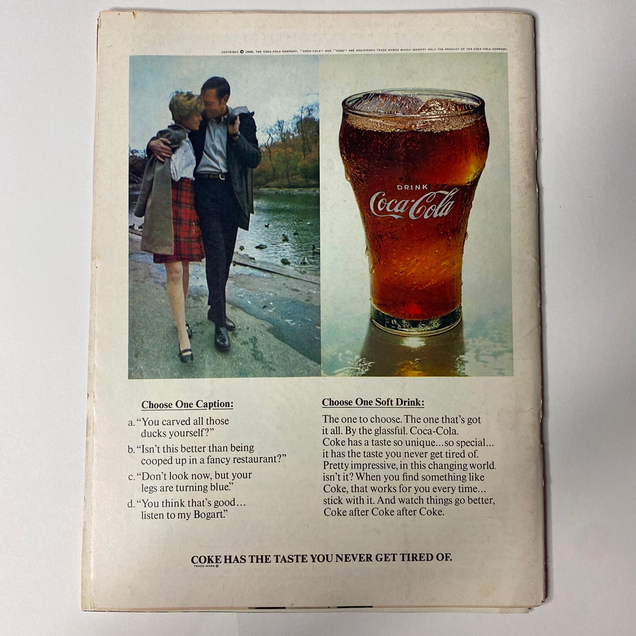 Back cover of Hullabaloo Magazine July 1968 featuring a humorous advertisement for Coca-Cola with two images: a couple in a park and a glass of Coke. This vintage magazine issue includes The Beatles, making it a collectible for music and pop culture fans.