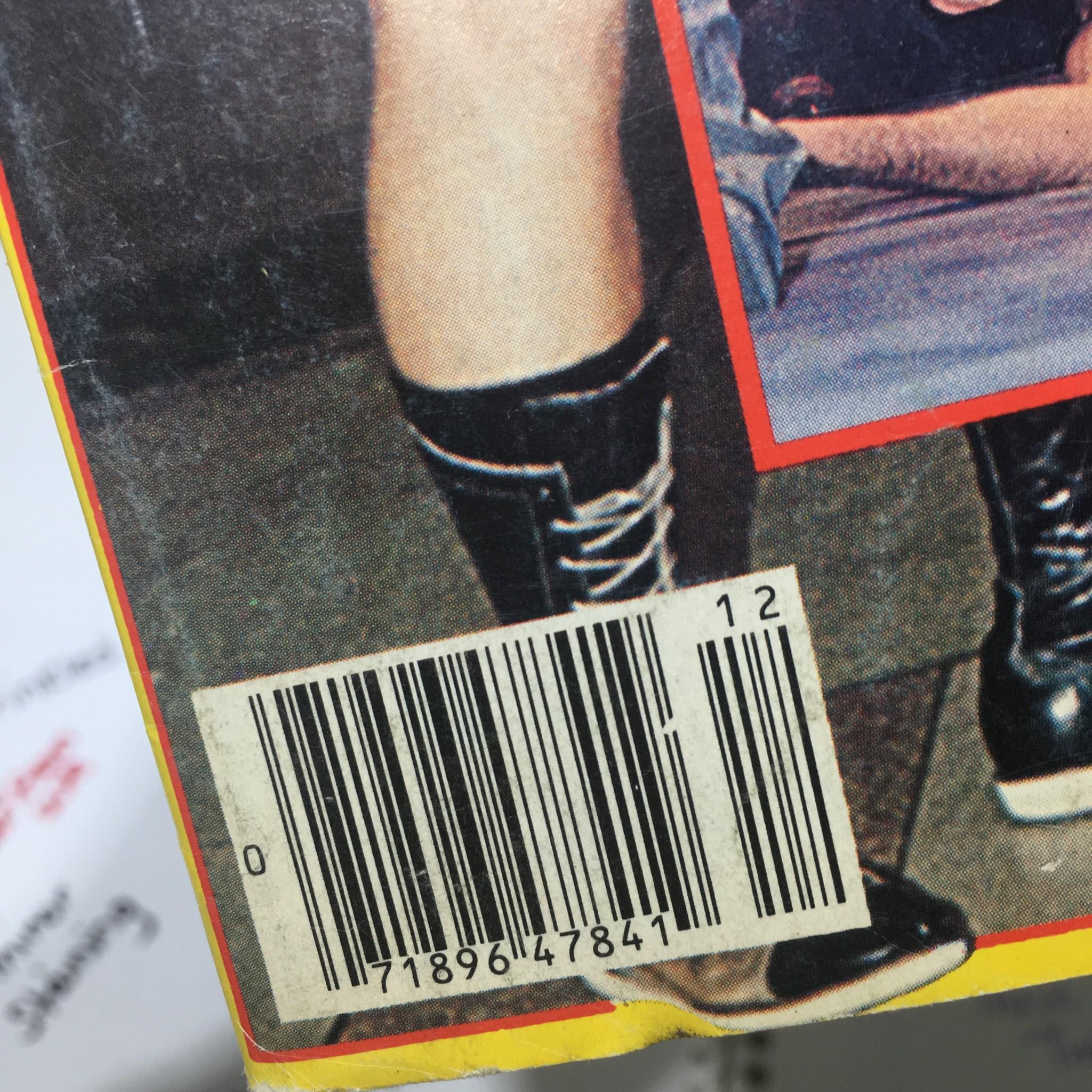 Close-up of the barcode on the back cover of the Sports Review Series: Wrestling Super Stars December 1977 magazine, featuring the trademark 'Graham VS Race' boxing imagery.