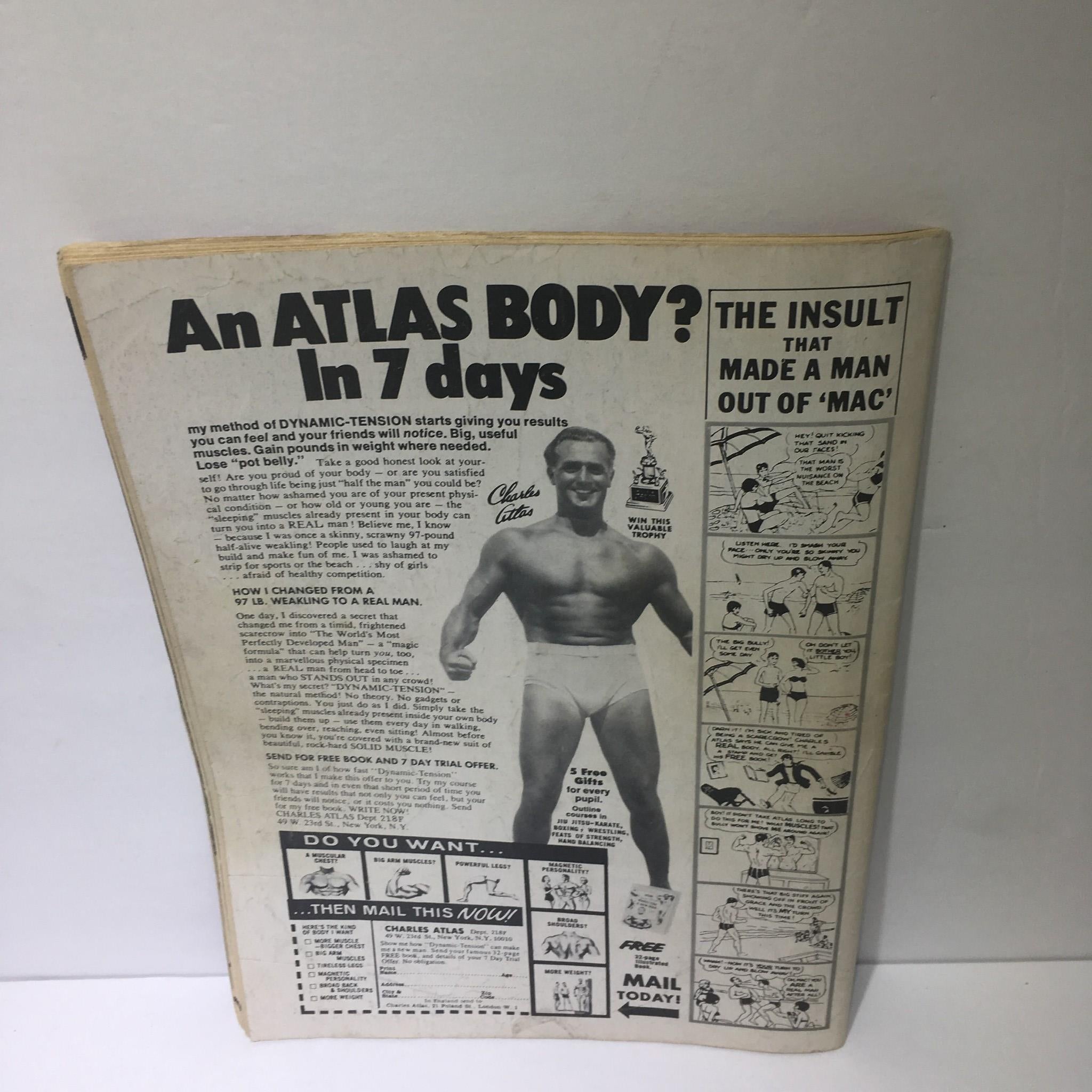 Back cover of the Victory Sports Series: Wrestling Annual - Fall 1977, featuring an advertisement for Charles Atlas's fitness program along with illustrations.