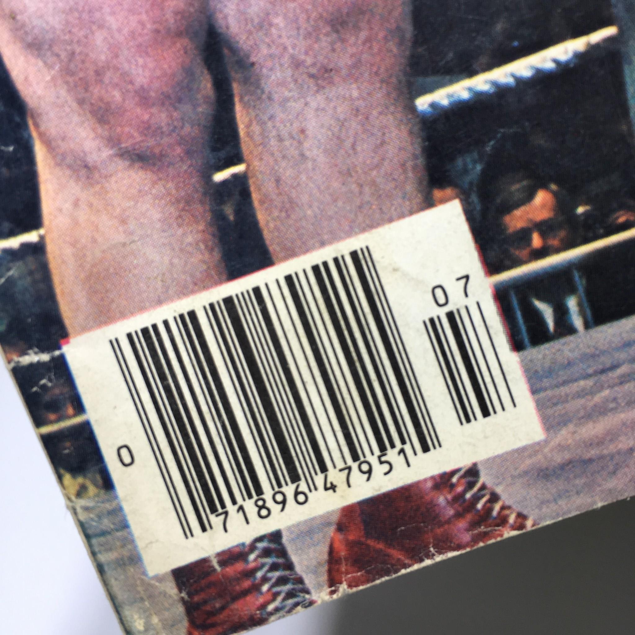 The back cover of The Wrestler Magazine July 1976 displaying its barcode and details, emphasizing the vintage nature of this wrestling publication.