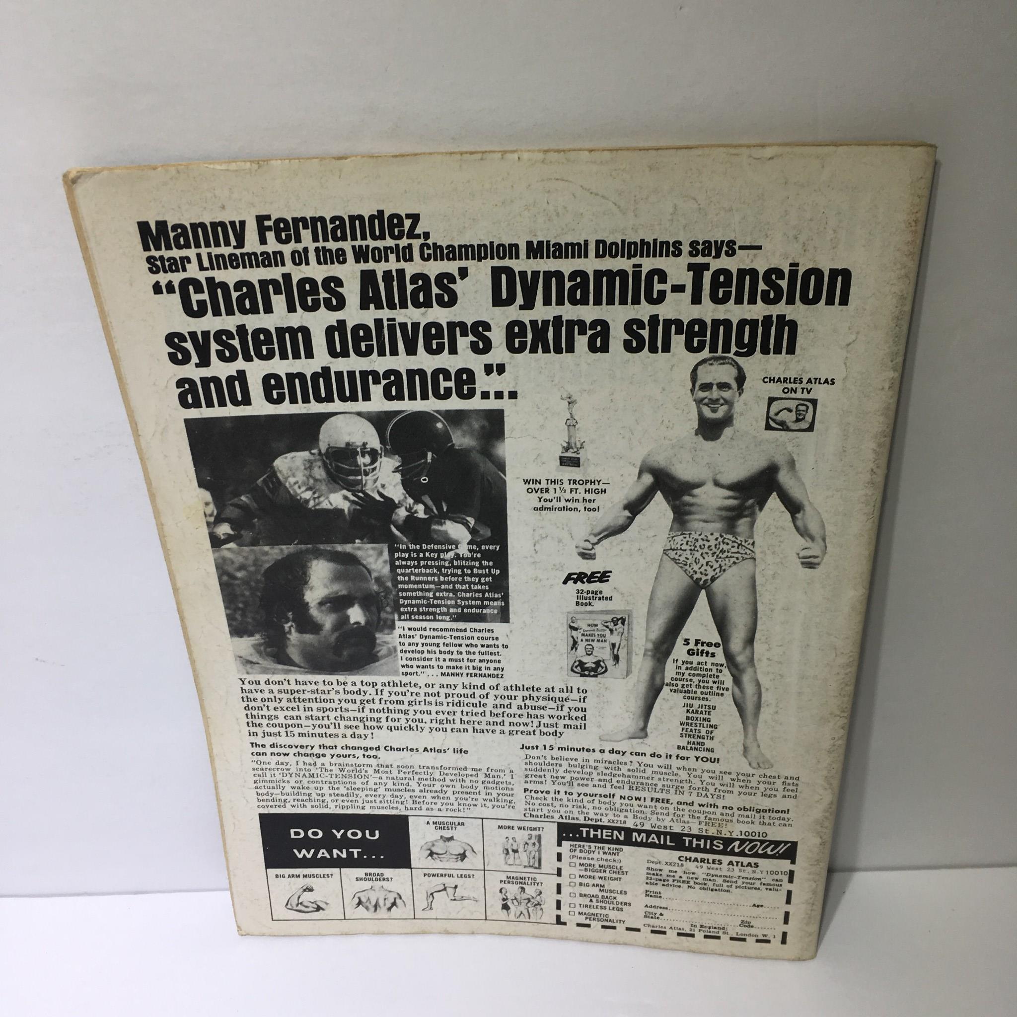 Back view of The Wrestler Magazine October 1976, featuring a promotional ad for Charles Atlas and showcasing the magazine's historical context.