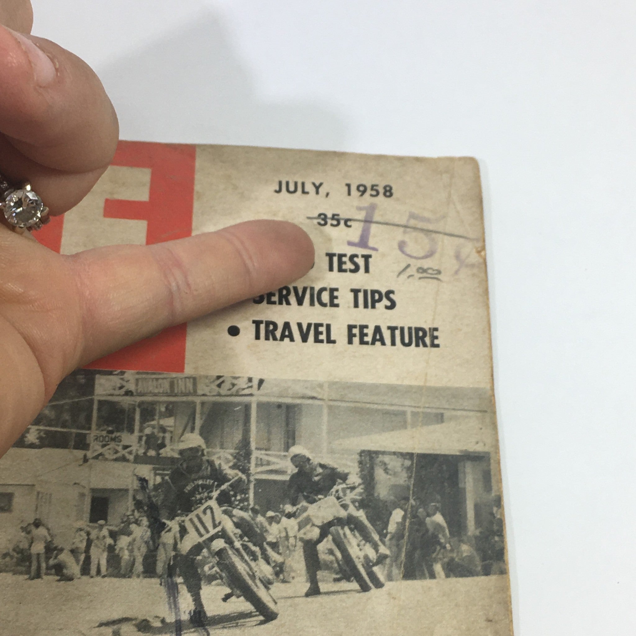 Close-up of the top section of VTG Cycle Magazine July 1958 highlighting the publication date and price.