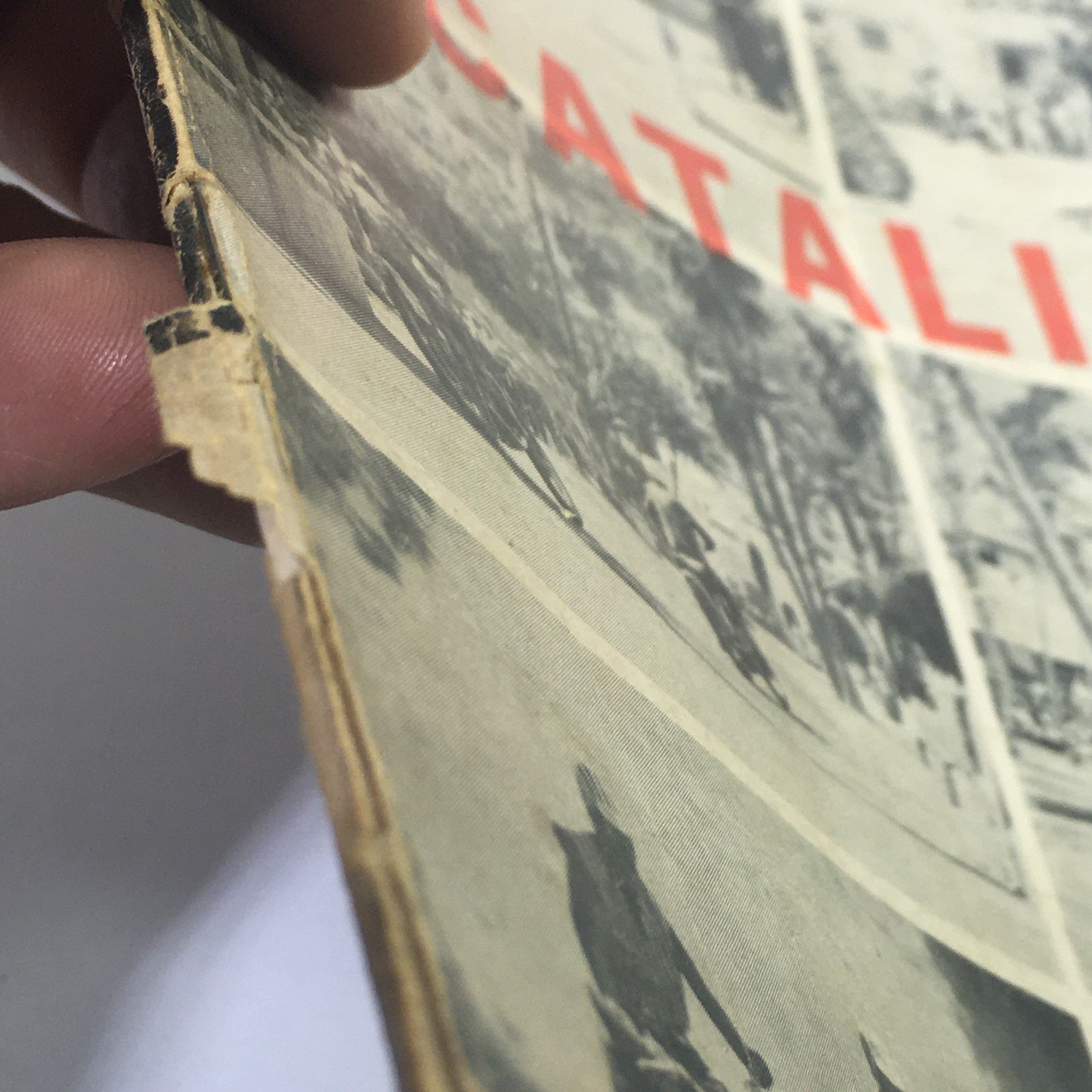 Close-up view of the edge of VTG Cycle Magazine July 1958 highlighting its vintage condition and design.