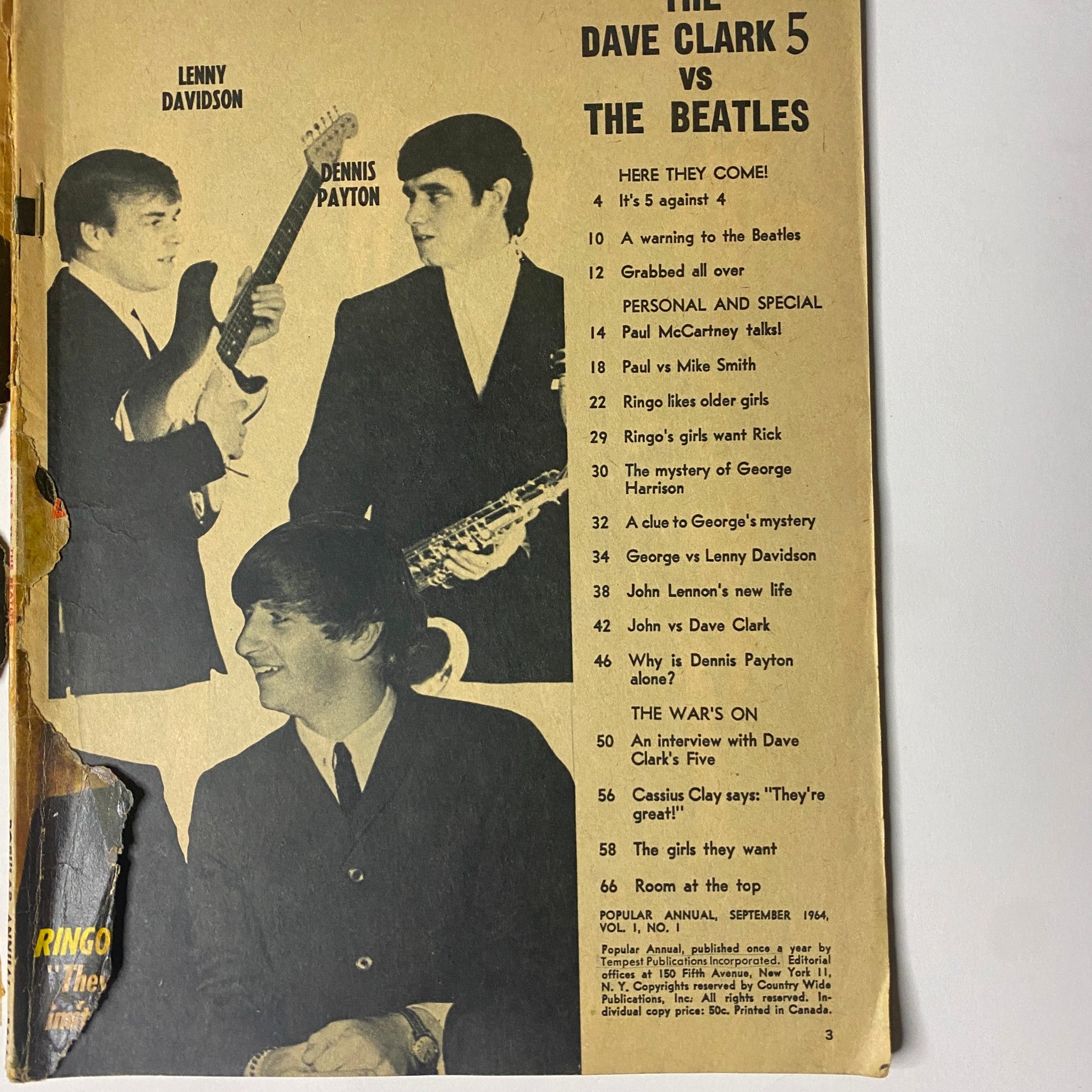 Interior page of 'Popular Annual Magazine 1964' highlighting the rivalry between The Dave Clark Five and The Beatles, showcasing content topics such as interviews and reviews.