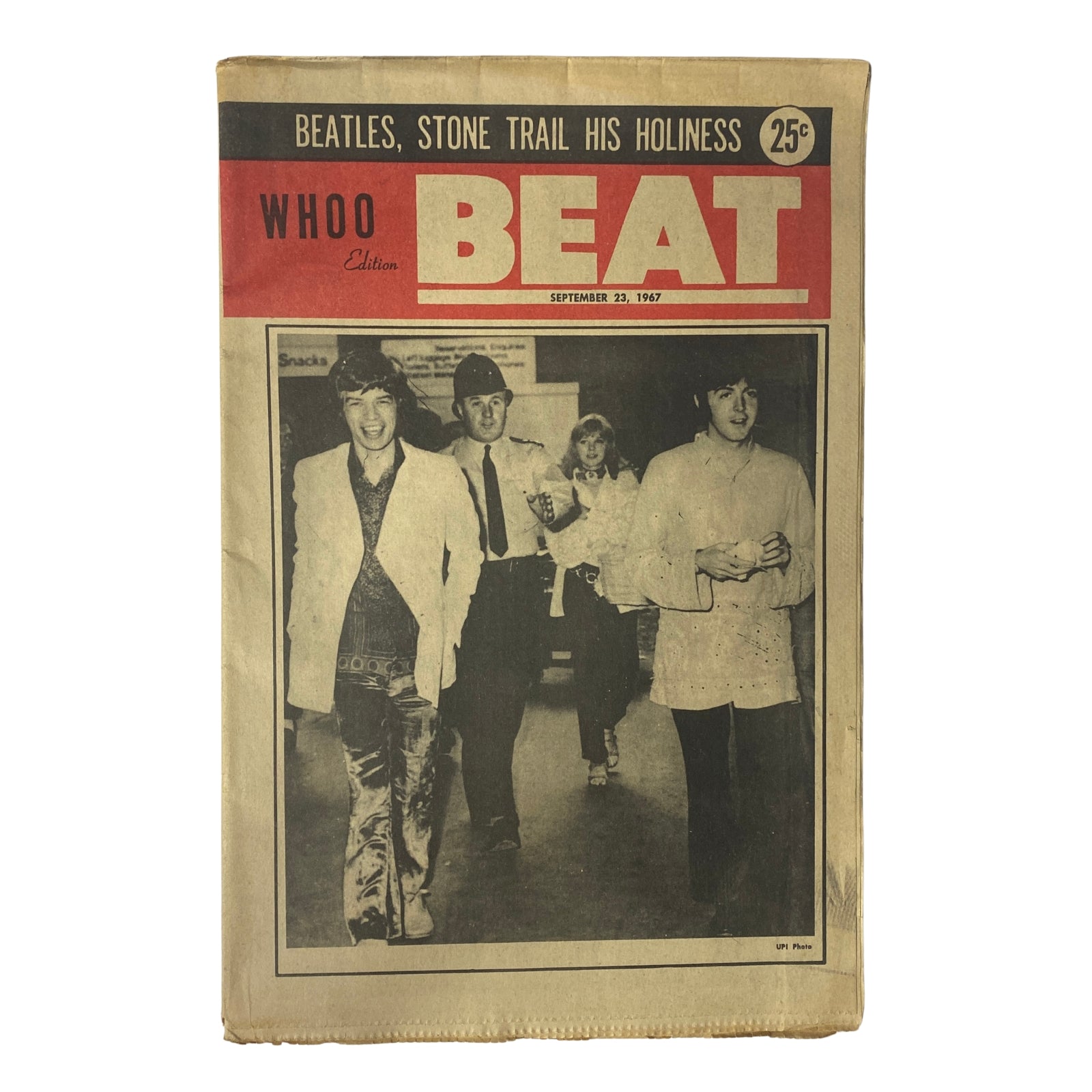 Cover of Whoo Beat Tabloid Magazine from September 23, 1967 featuring an image of The Beatles walking together, highlighting the cultural essence of the late 1960s music scene.