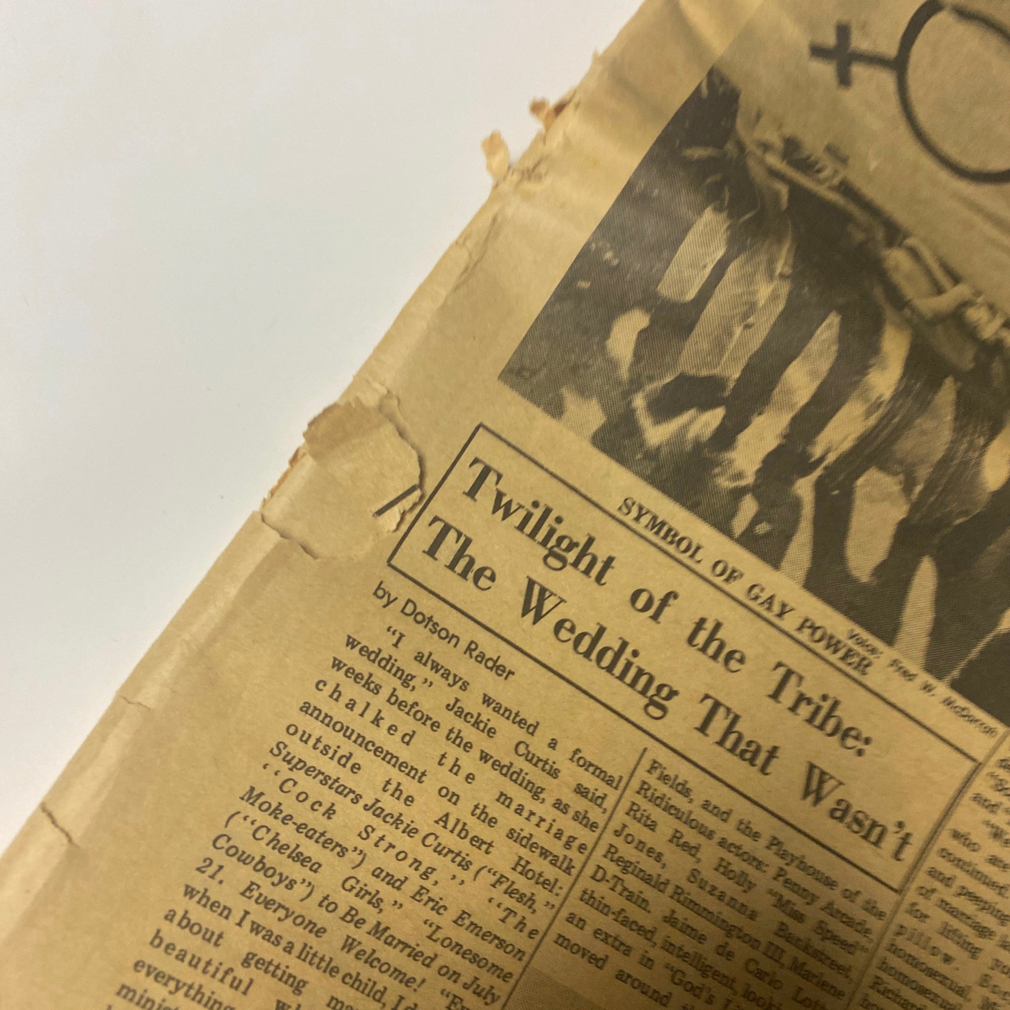 Close-up detail of an article titled 'Twilight of the Tribe: The Wedding That Wasn’t' from The Village Voice July 1969, highlighting content related to political and social issues.