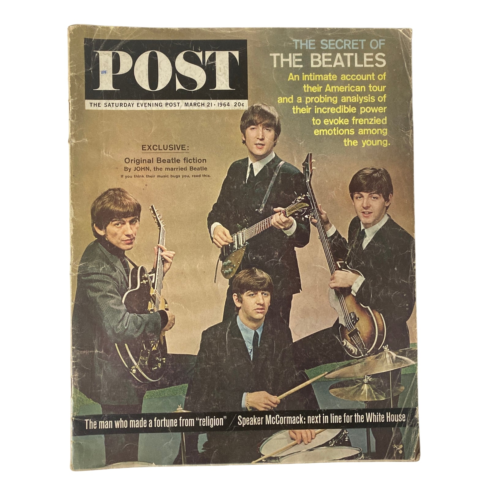 Cover of The Saturday Evening Post from March 21, 1964, featuring The Beatles, showcasing the band in a classic photo during their Beatlemania era.