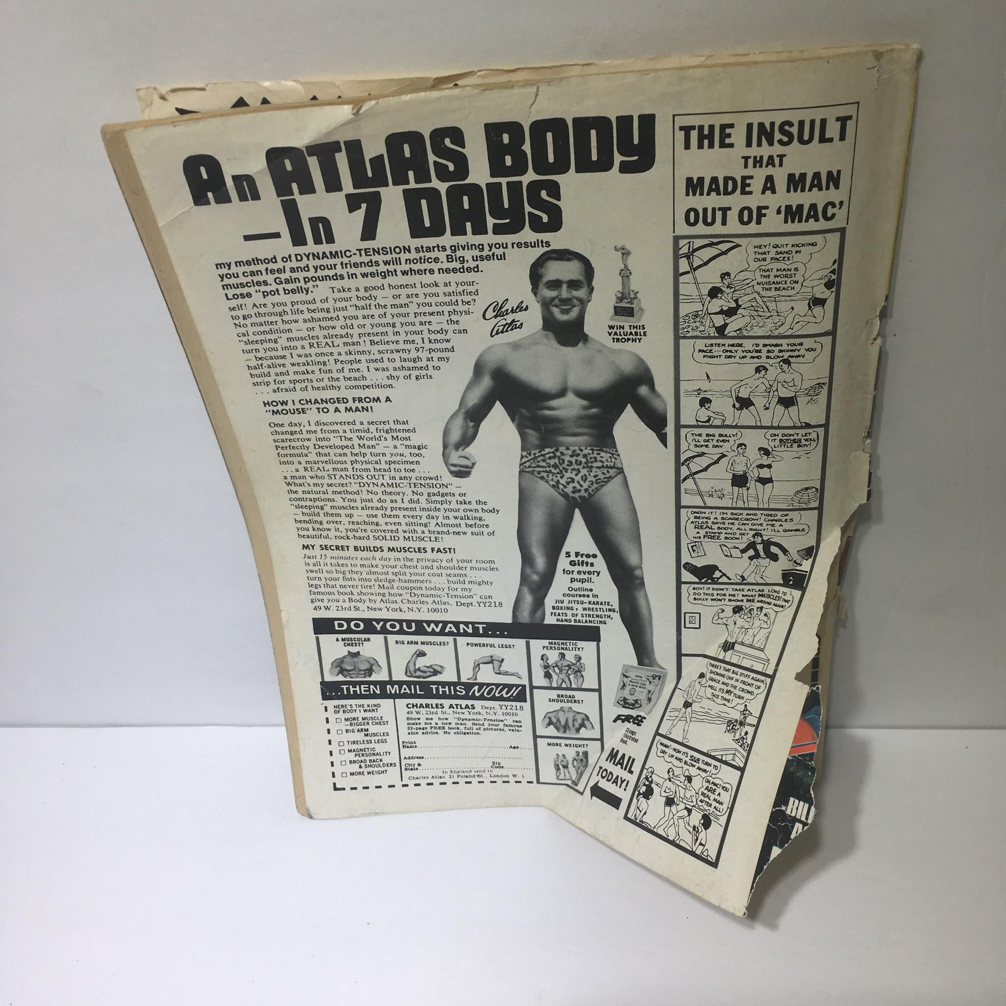 Vintage advertisement featuring a muscular male model promoting the Charles Atlas fitness program, part of The Wrestler Magazine December 1976 featuring Terry Funk and Bruno Sammartino.