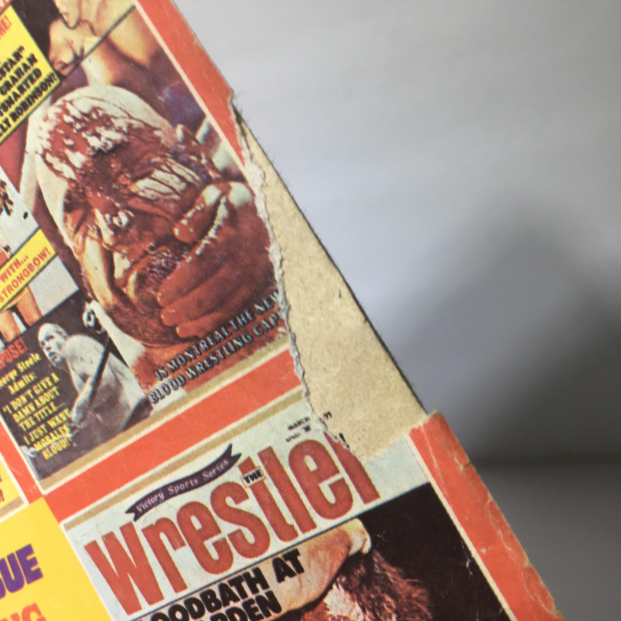 Detail showing the corner of The Best of Wrestler Magazine Winter 1976 with visible wear, capturing the vintage condition of the magazine.