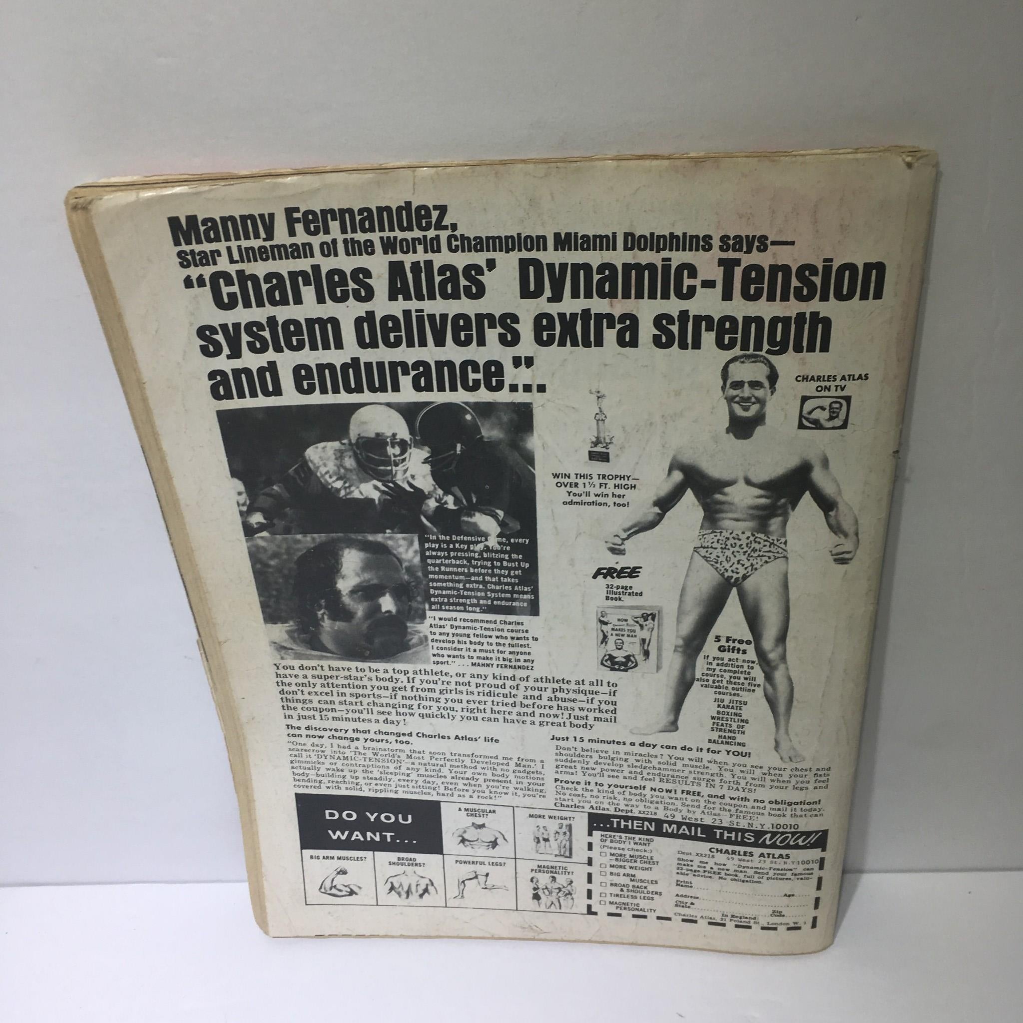 Back cover of 'The Best of Wrestler Magazine Winter 1976' featuring an advertisement for Charles Atlas' Dynamic-Tension system, highlighting testimonials and fitness tips.
