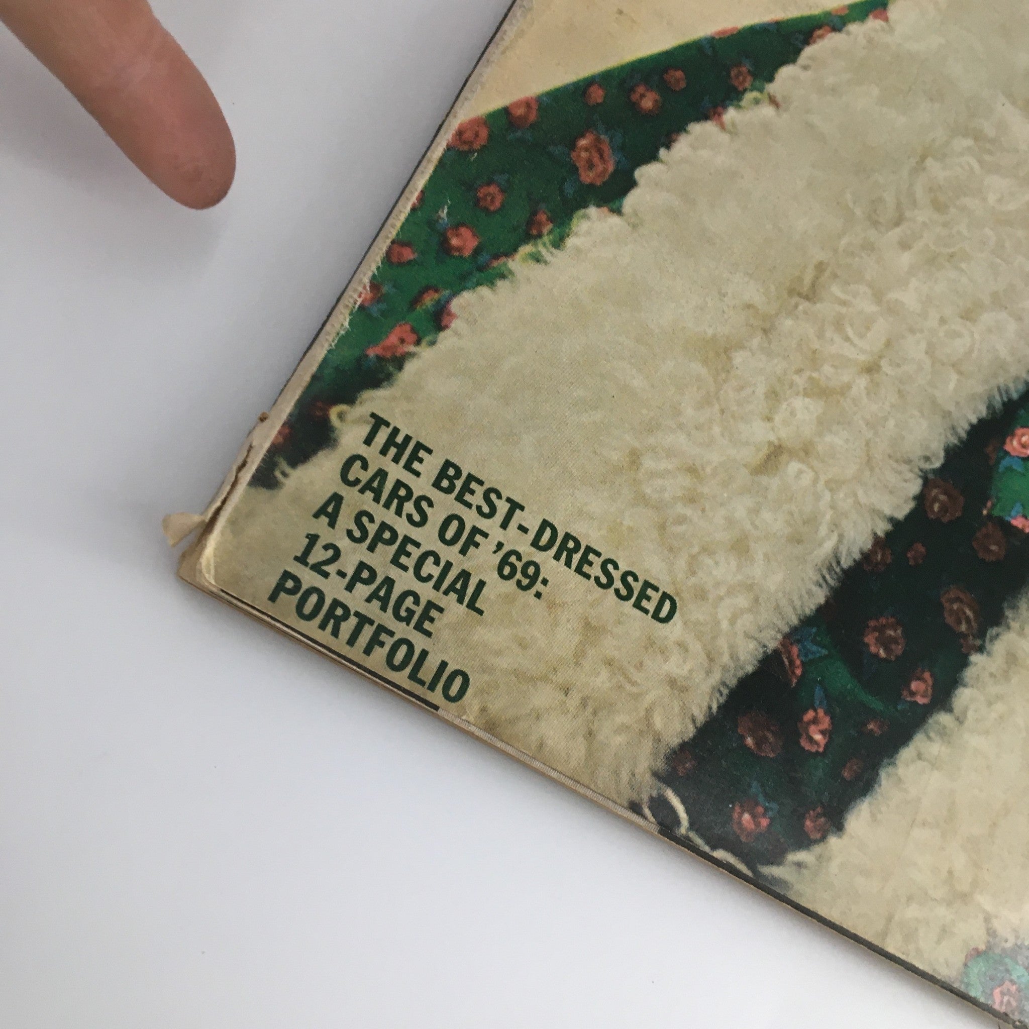 Close-up of the McCall's Magazine November 1968 featuring 'The Best-Dressed Cars of 69: A Special 12-Page Portfolio' text, highlighting the magazine's vintage style and collectible nature.