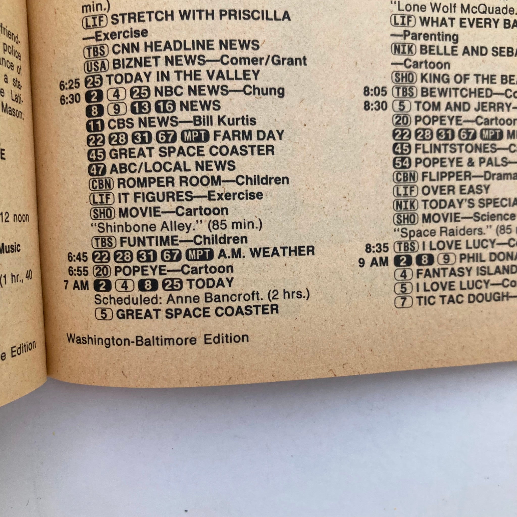 TV Guide Magazine from March 9, 1985 featuring the Washington-Baltimore Edition listing various television programs. It highlights shows such as 'Stretch with Priscilla', 'CNN Headline News', and 'Popeye'. This vintage magazine captures a snapshot of television history.