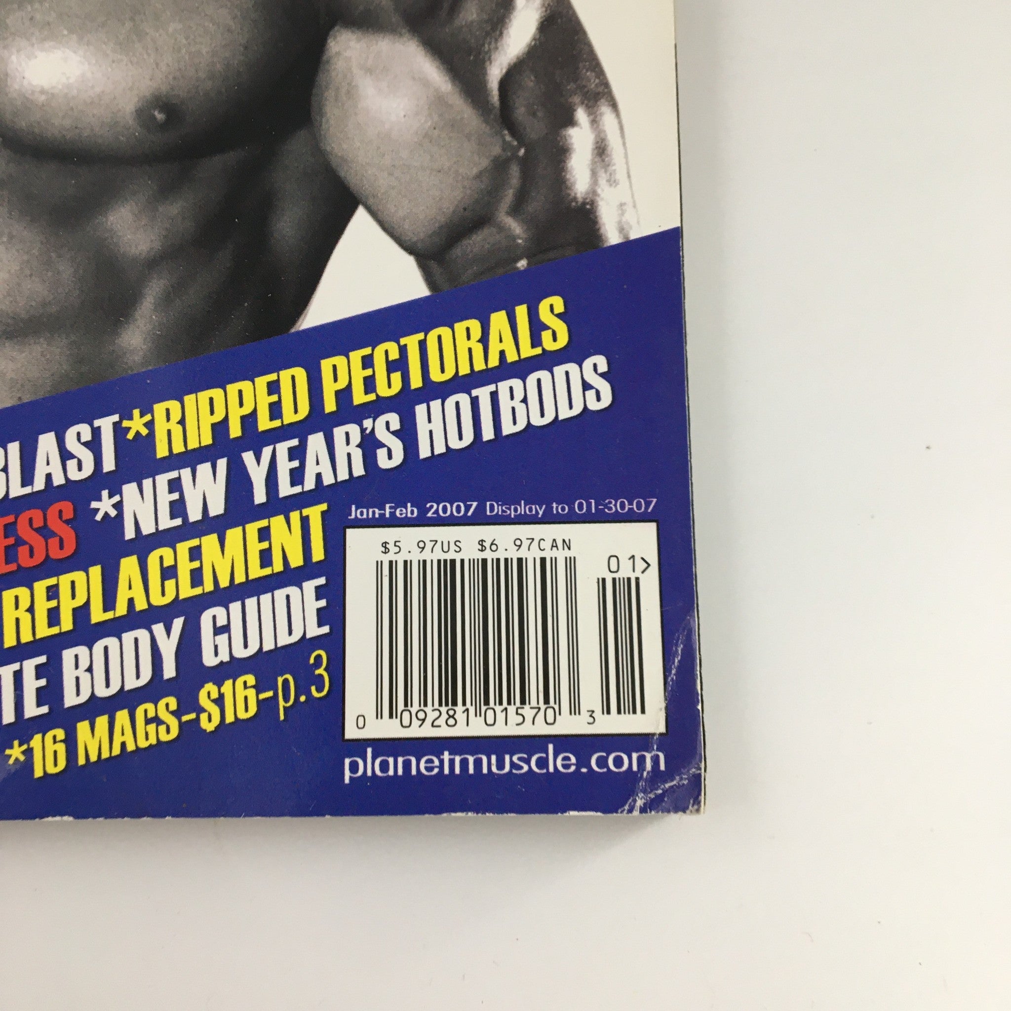 Close-up of the back cover and pricing details of Planet Muscle Magazine January February 2007, highlighting collectible features.