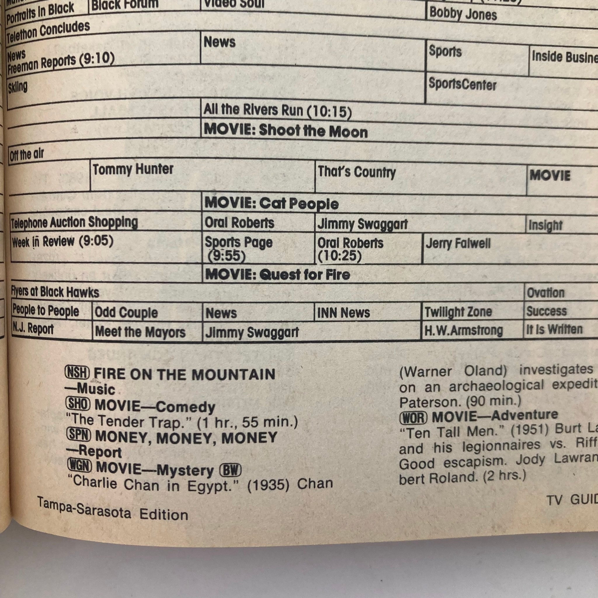 TV Guide Magazine article page featuring television program listings and movie descriptions from January 28, 1984, in the Tampa-Sarasota edition. Includes titles such as 'All the Rivers Run' and 'Cat People.'