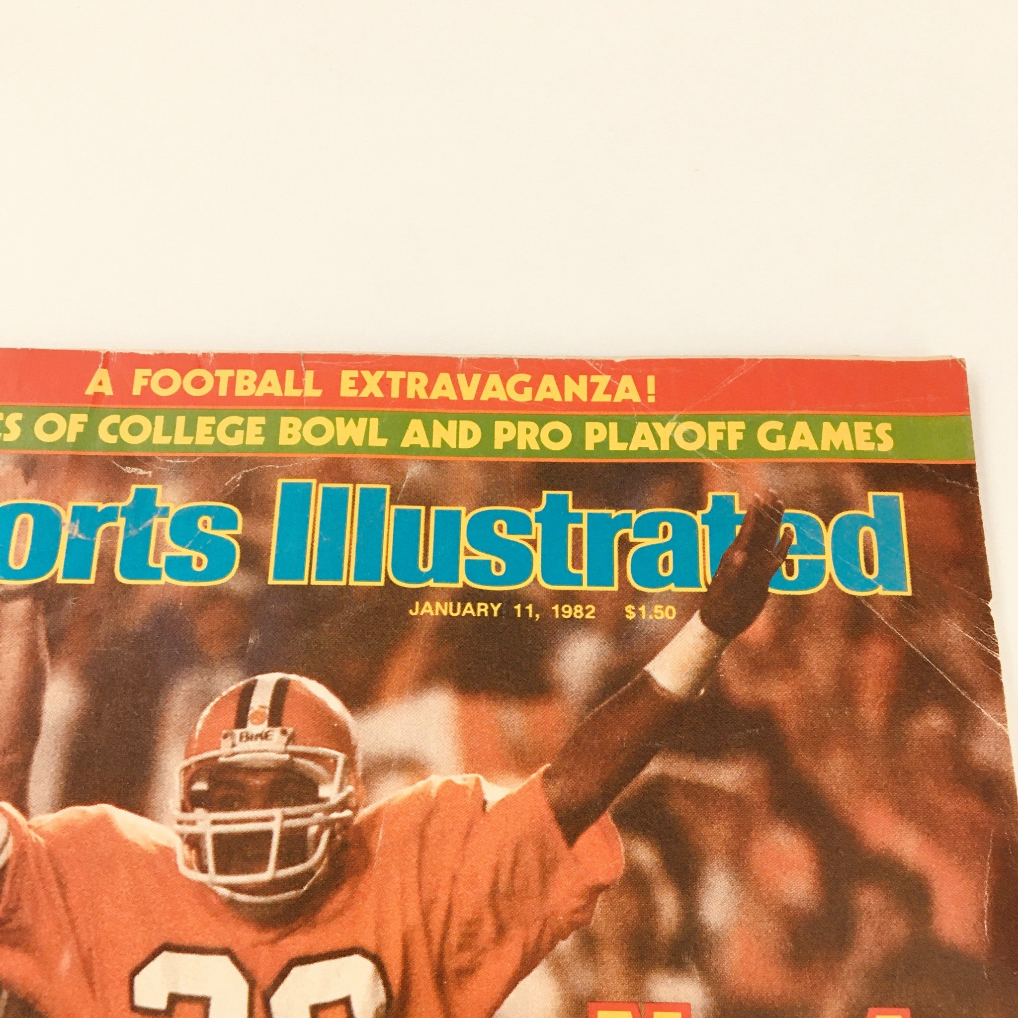 Cover of Sports Illustrated Magazine January 11 1982 featuring Perry Tuttle of Clemson celebrating on the field with a football.
