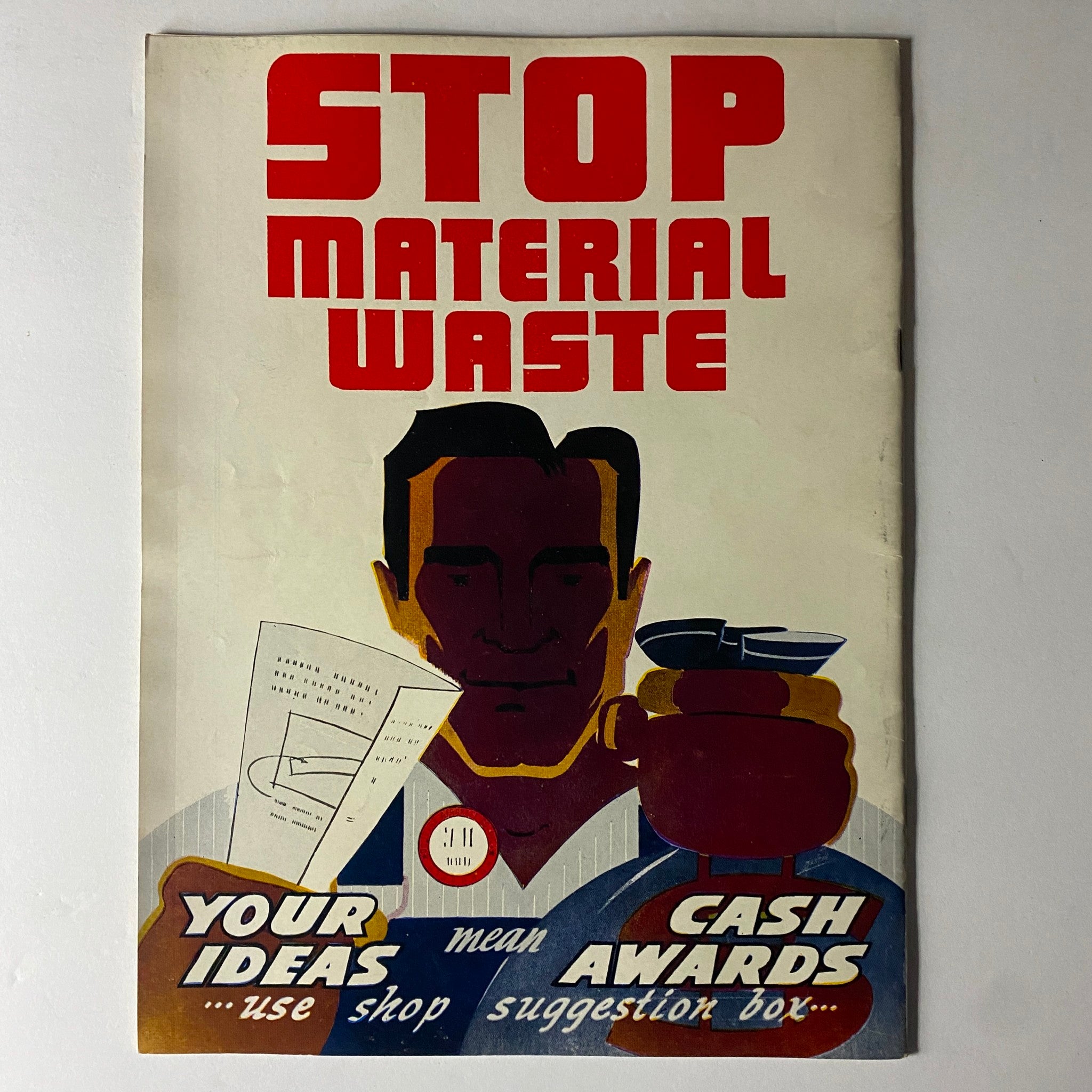 Cover of the Douglas Airview Magazine September 1940, showing a graphic illustration with the message 'Stop Material Waste' and emphasizing the importance of efficiency in manufacturing.