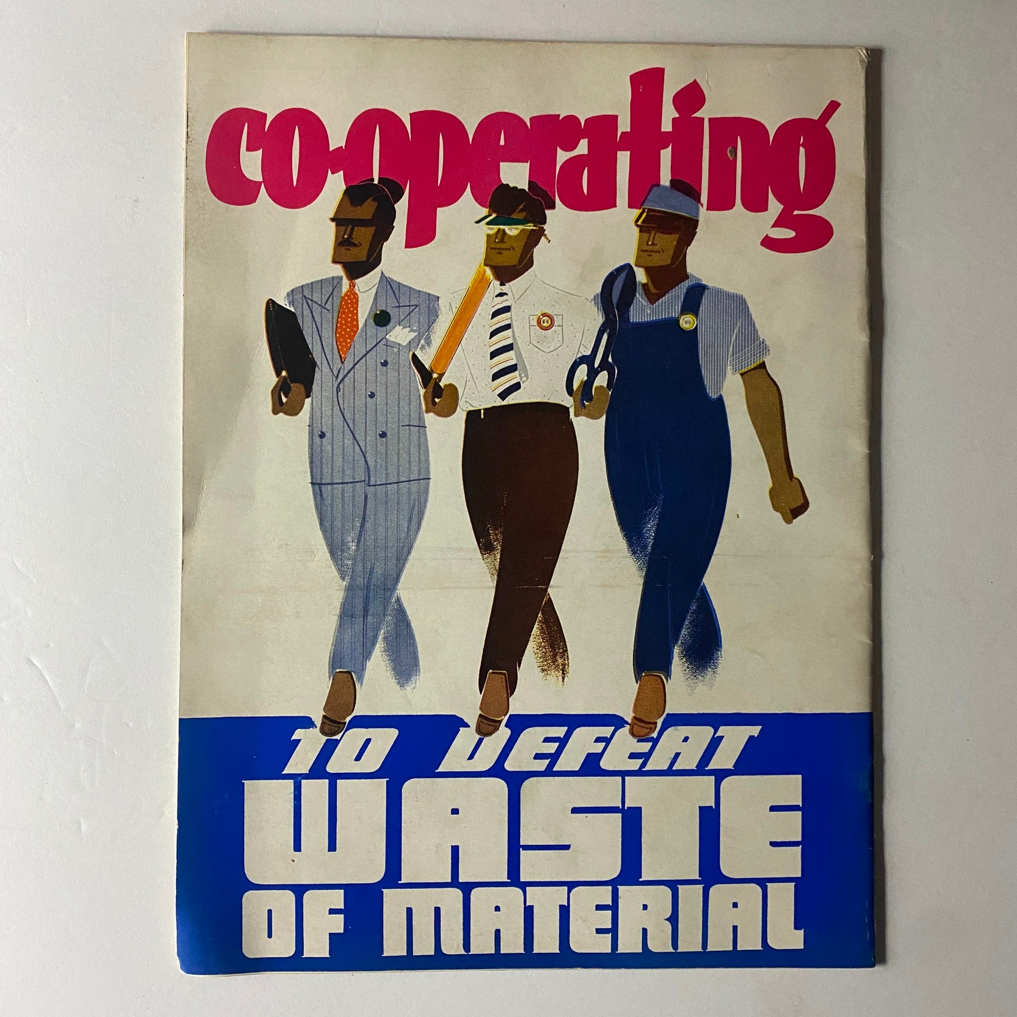Douglas Airview Magazine December 1940 featuring a cover illustration depicting three stylized figures representing various professions, emphasizing the theme 'Co-operating to Defeat Waste of Material.' This vintage magazine highlights historical advancements in aerial security during a significant era in aviation.