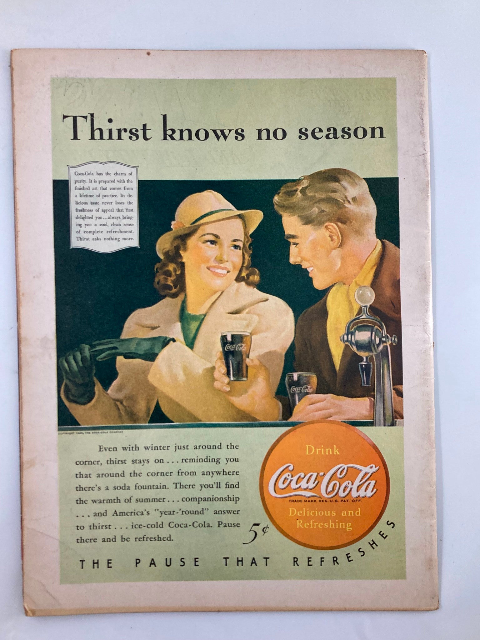 Vintage Coca-Cola advertisement from VTG Liberty Magazine November 16 1940, showcasing a refreshing drink with a slogan 'Thirst knows no season'.