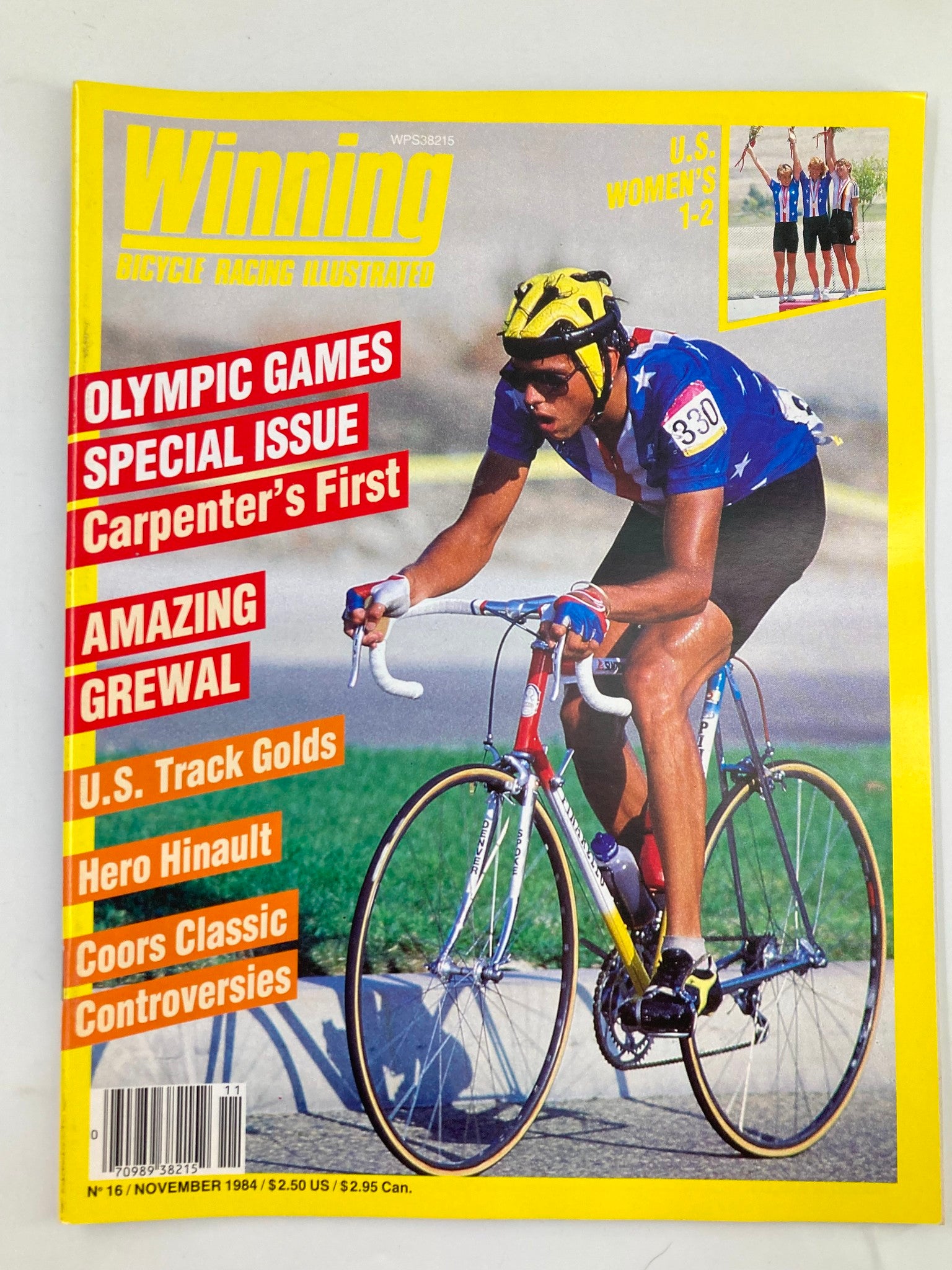 VTG Winning Bicycle Racing Illustrated November 1984 cover featuring a cyclist wearing an American flag jersey, highlighting Olympic Games and special features, in good condition with minor wear.