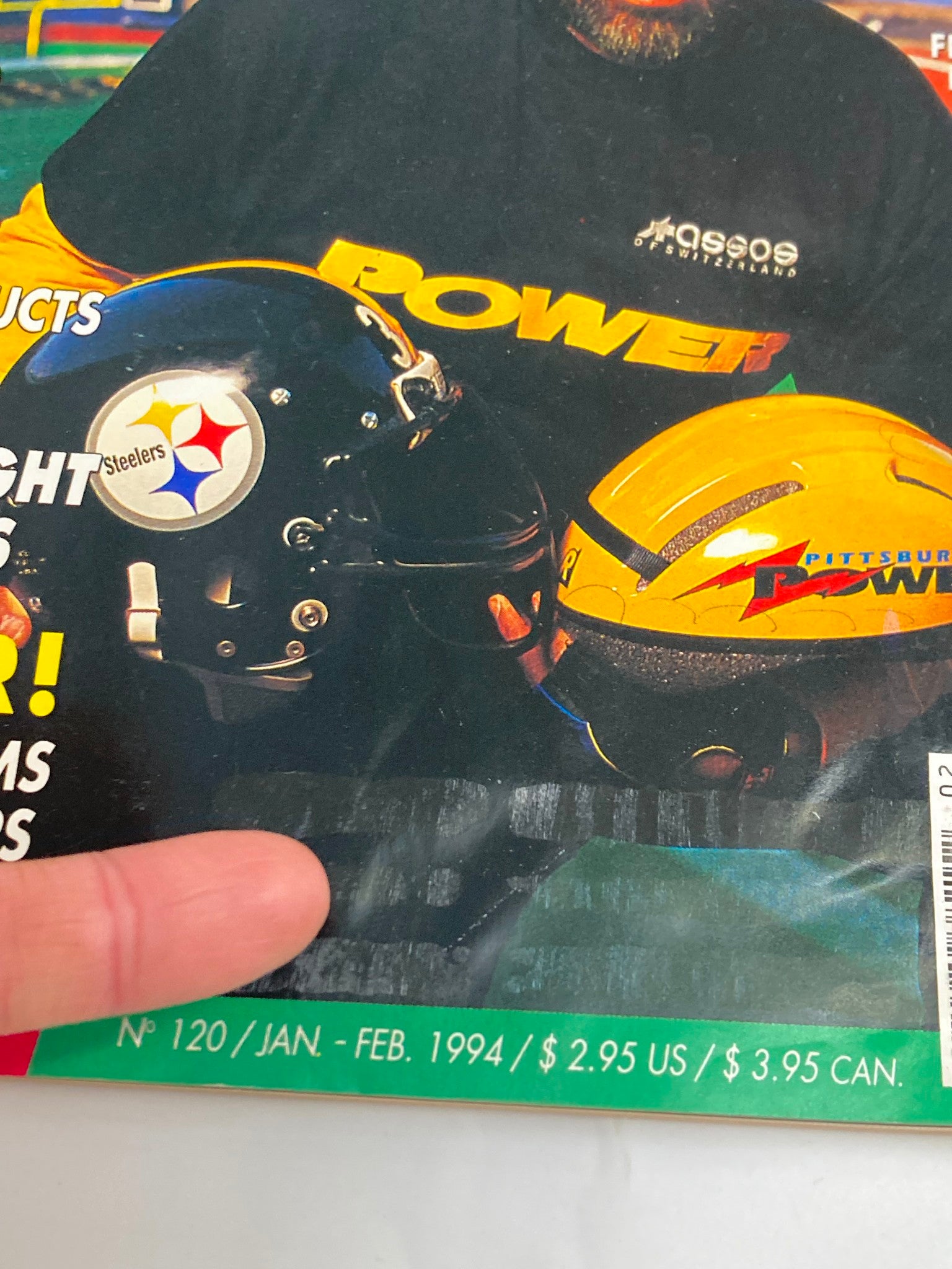 Cover of Winning Bicycle Racing Illustrated January 1994 featuring a NFL-style helmet and a cycling helmet, highlighting Franco Harris, an NFL legend associated with cycling.