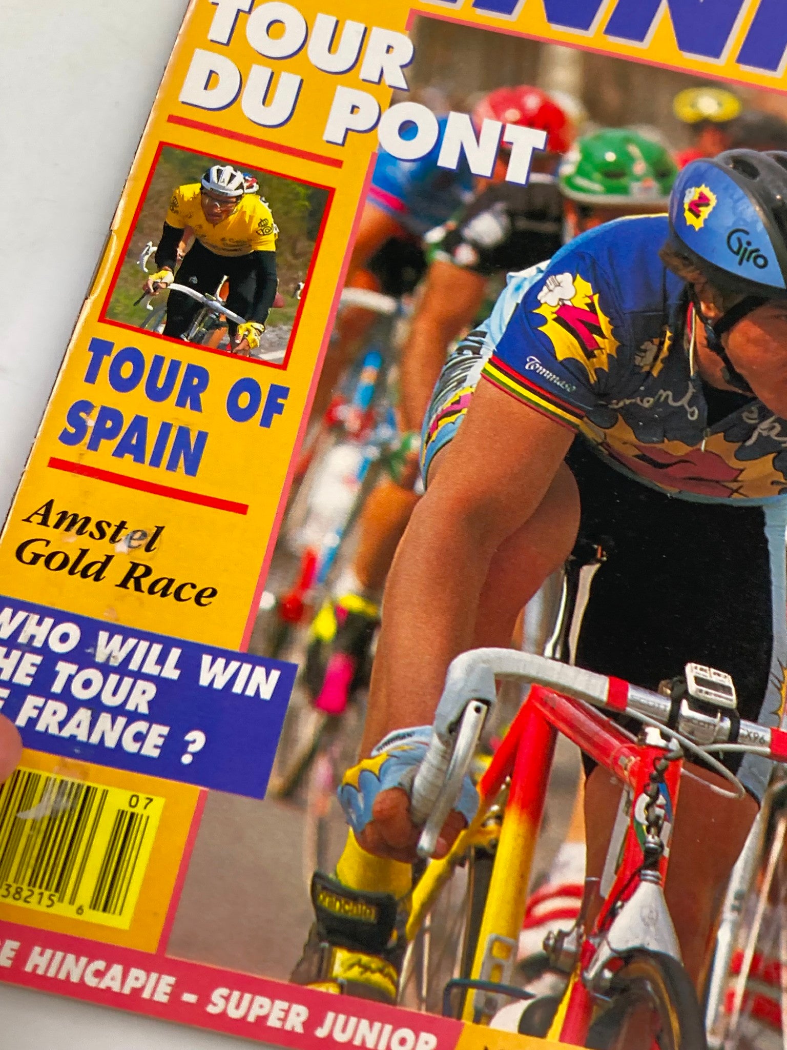 Cover of Winning Bicycle Racing Illustrated, July 1991, featuring a cyclist in a yellow jersey participating in the Tour of Spain. The magazine highlights key competitive cycling events and includes images of racers in action.