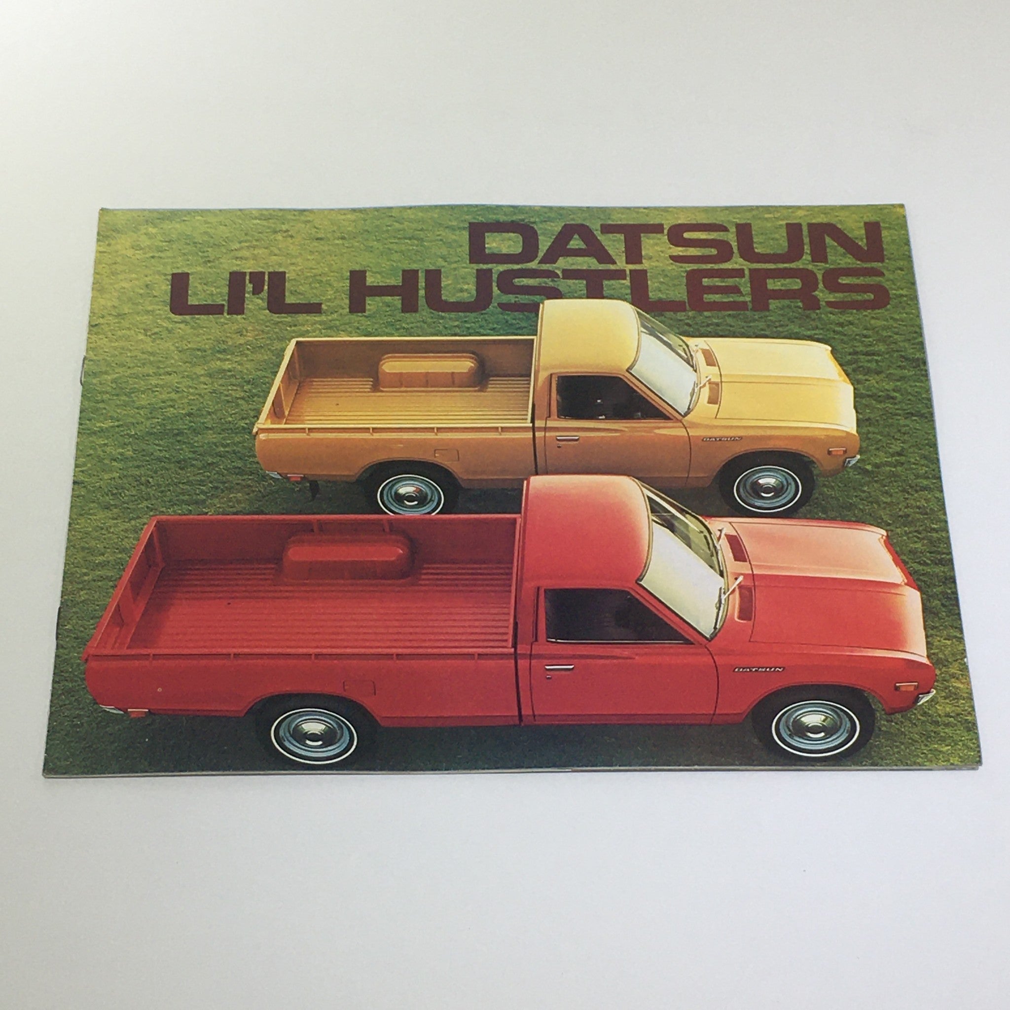 Vintage 1976 Datsun 600 Lil' Hustlers 4-Speed Stick Shift Car Catalog Brochure