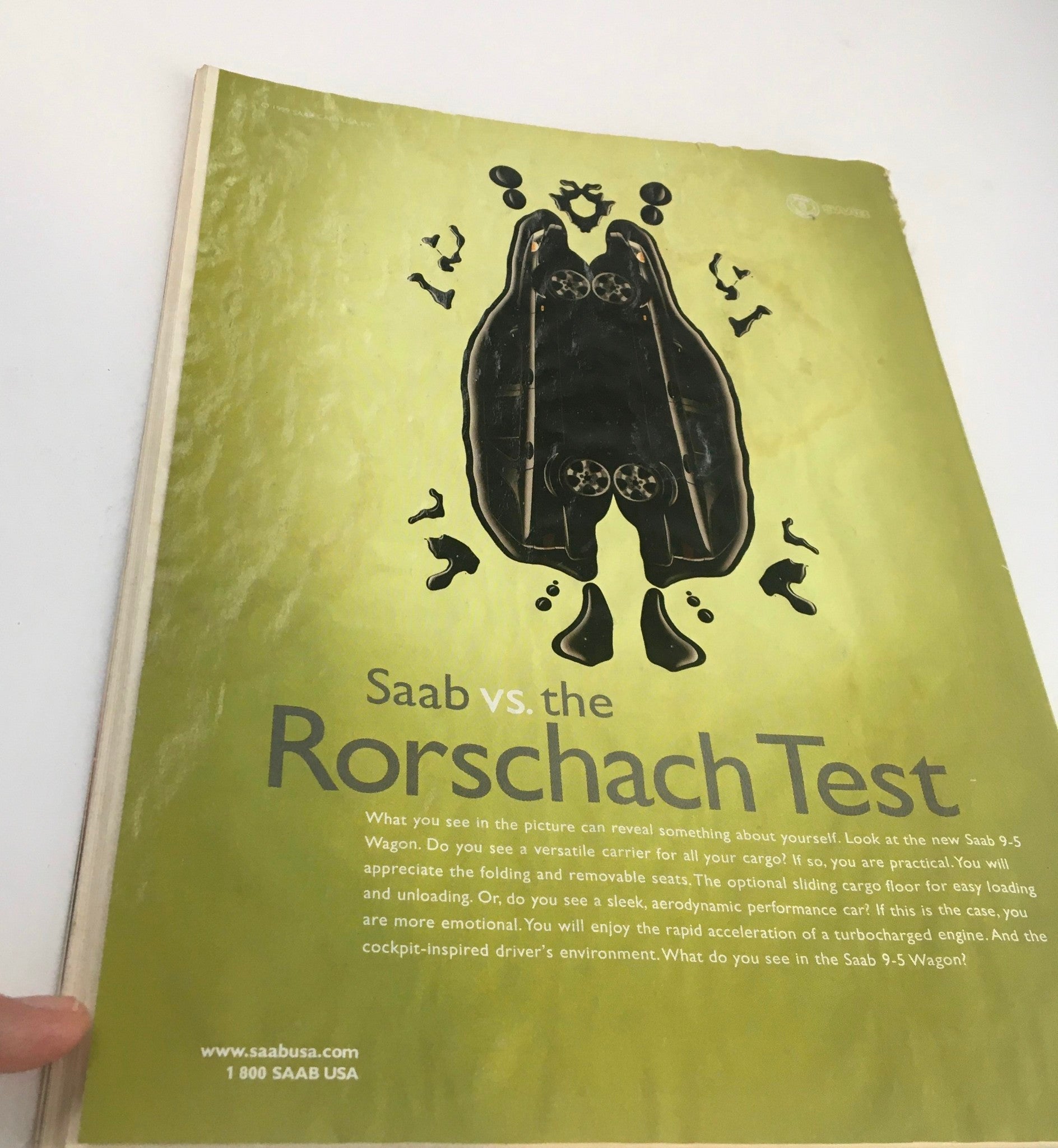Magazine page from The New Yorker featuring an advertisement for Saab with a Rorschach test theme, showcasing creativity and engaging design. Title: The New Yorker Full Magazine June 14 1999 Family Portrait by William Steig.