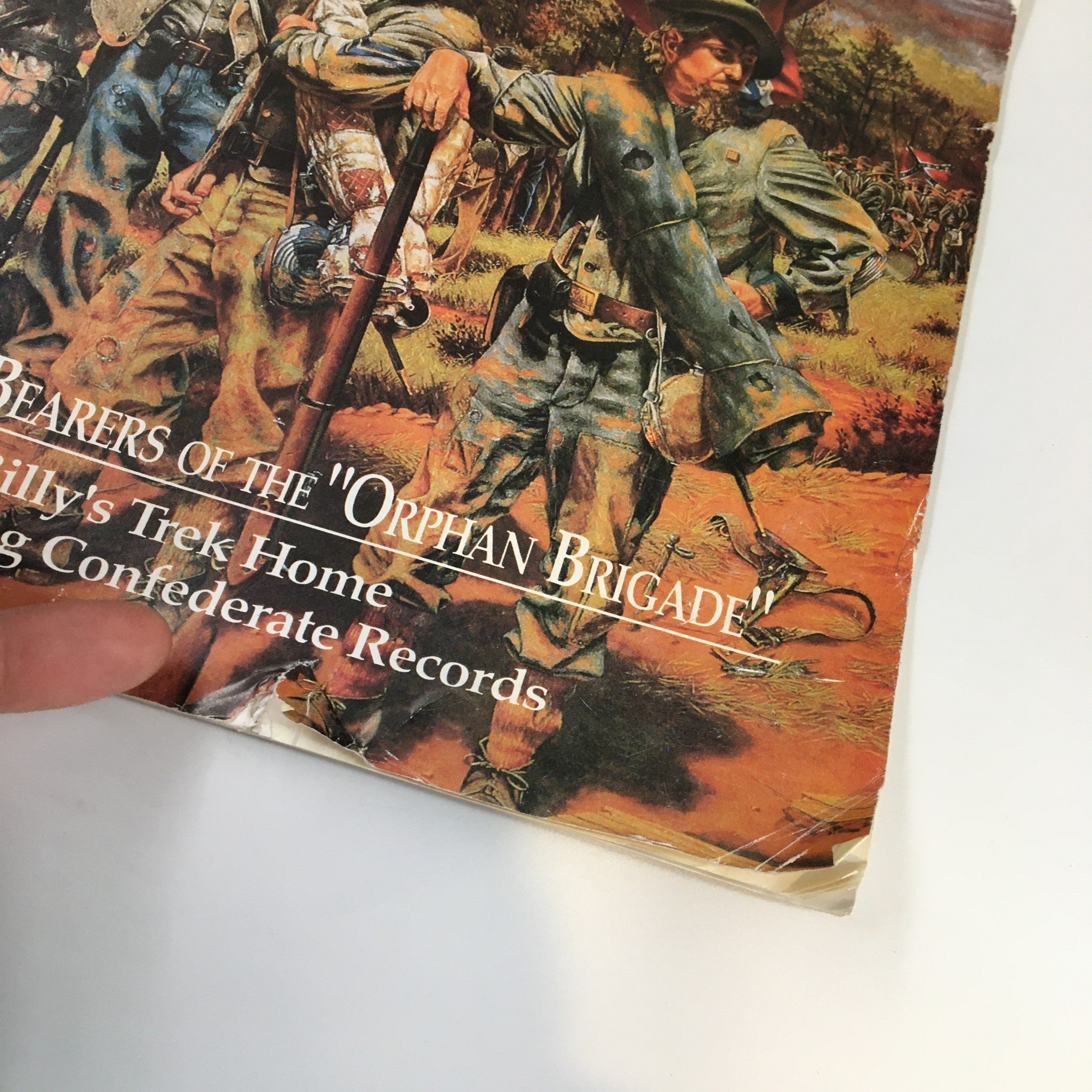 Close-up of the Confederate Veteran Magazine July 1993, highlighting the title Color-Bearers of the Orphan Brigade, showing detailed artwork of soldiers.