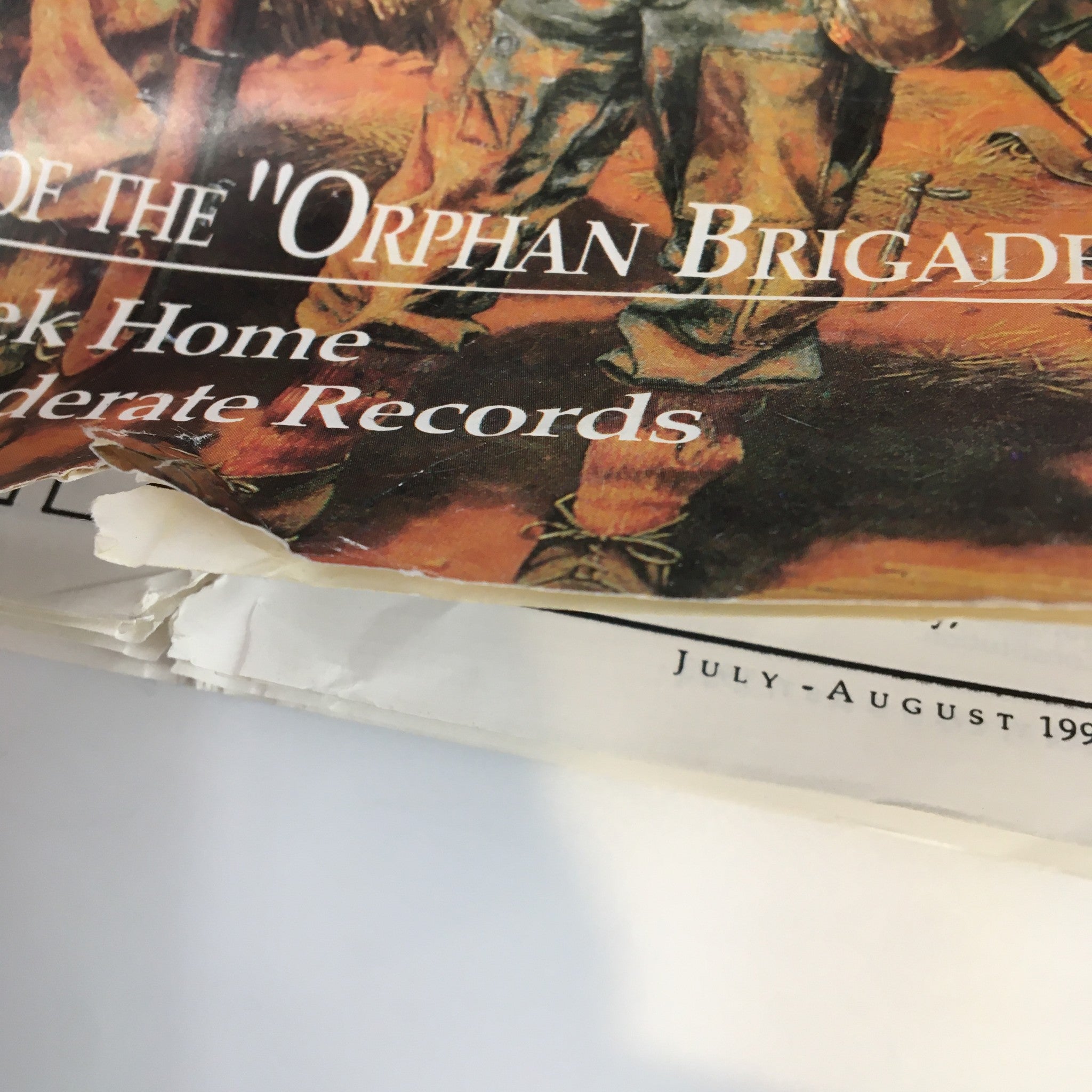 Close-up view of the cover of the July 1993 Confederate Veteran Magazine, focusing on the theme 'Color-Bearers of the Orphan Brigade'.
