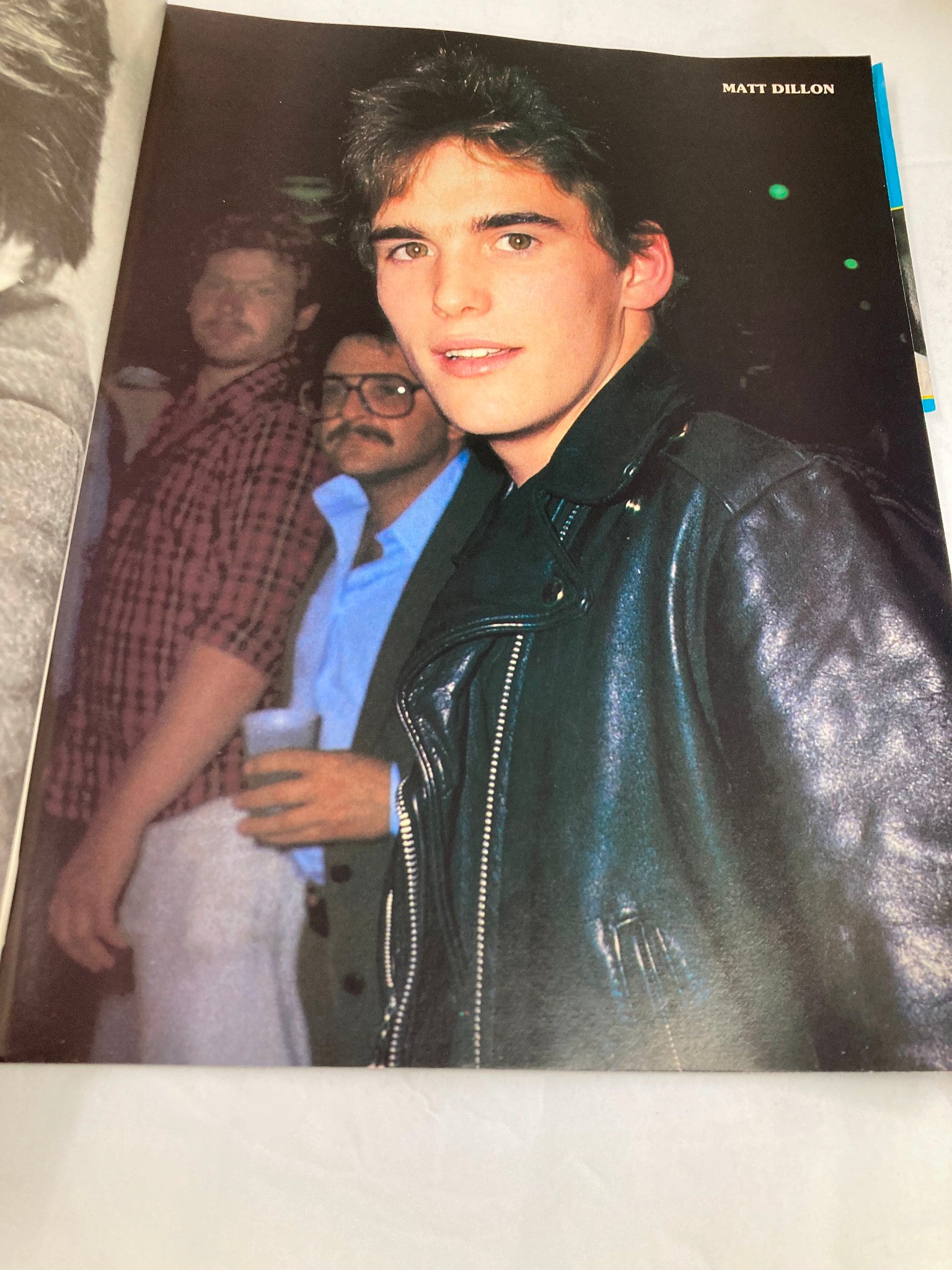 Image of Matt Dillon from VTG Hollywood's Sexy Rebels Yearbook 1984 #33, showcasing the iconic 1980s style and atmosphere in a casual setting.