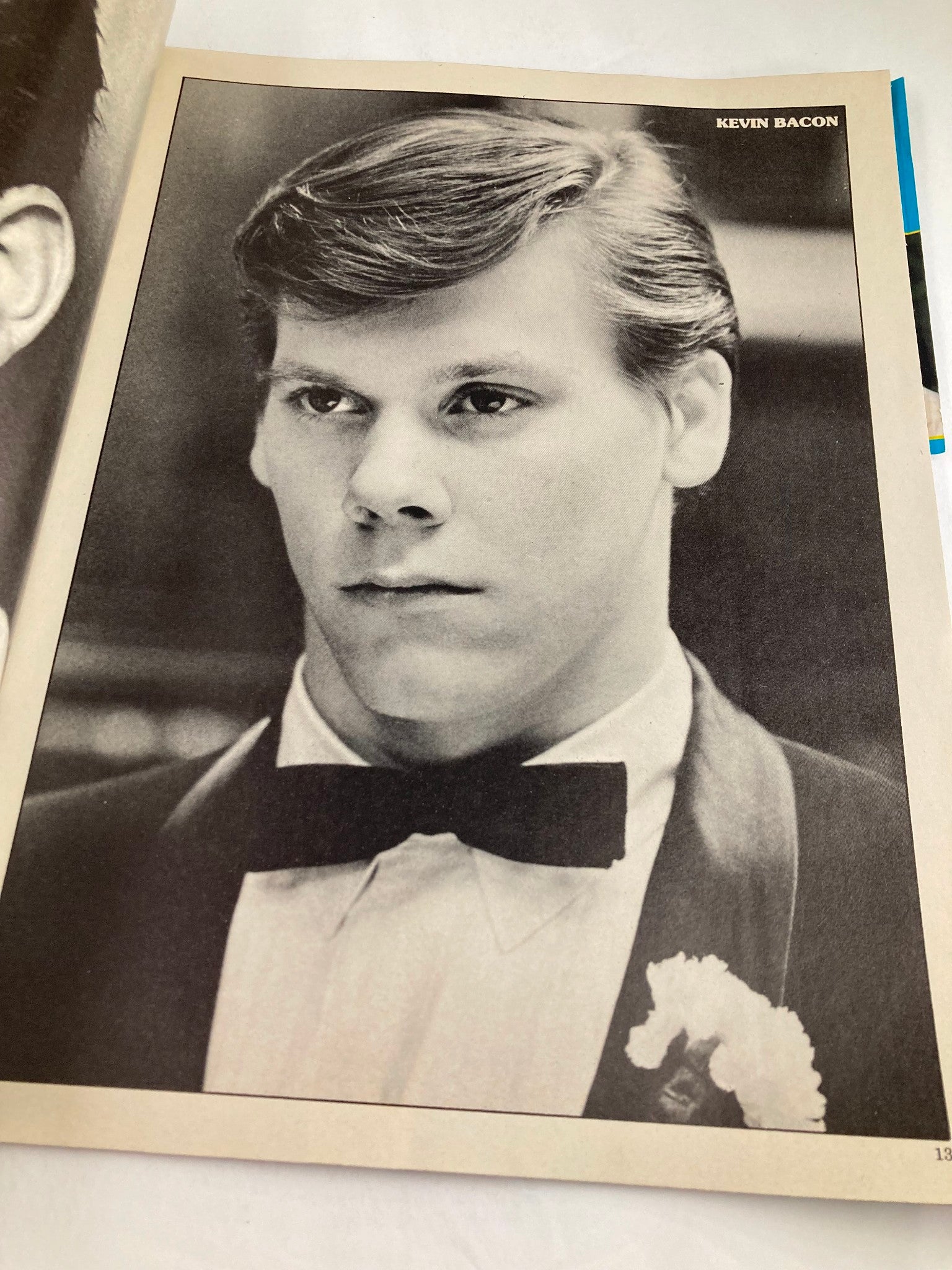 Vintage photograph of Kevin Bacon from the VTG Hollywood's Sexy Rebels Yearbook 1984, showcasing his classic hairstyle in a tuxedo style.
