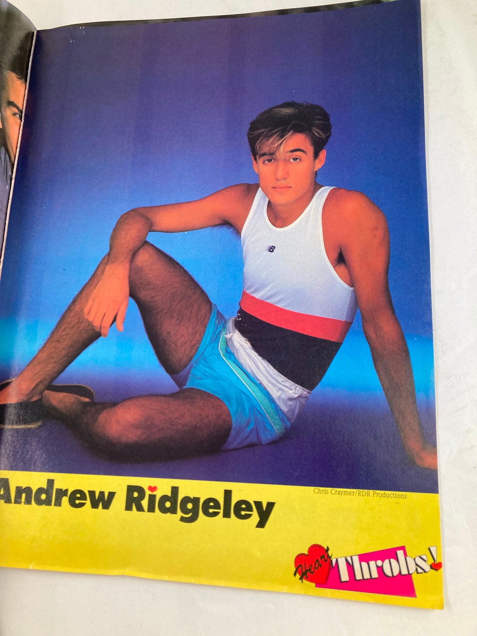 VTG Heart Throbs Magazine Autumn 1985 featuring Andrew Ridgeley in a stylish posed photograph wearing a tank top and shorts against a colorful backdrop.