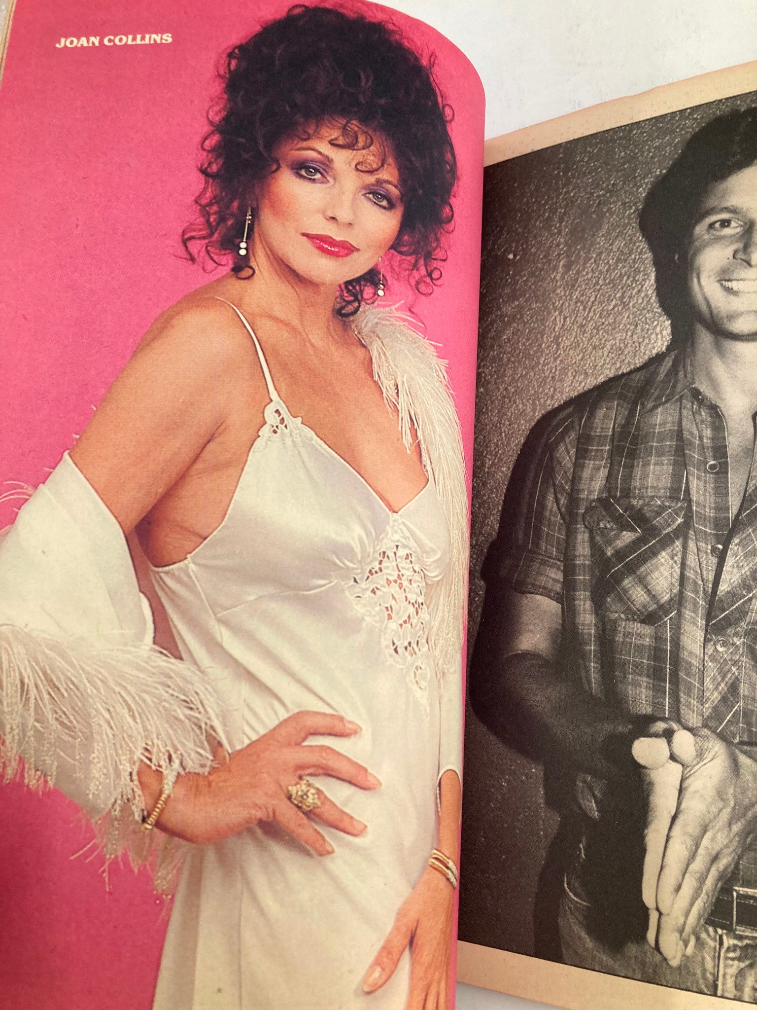 Vintage Modern Screen Yearbook No. 23 1983 showcasing actress Joan Collins in a glamorous pose against a bright pink background, epitomizing the iconic fashion and beauty of the 1980s.