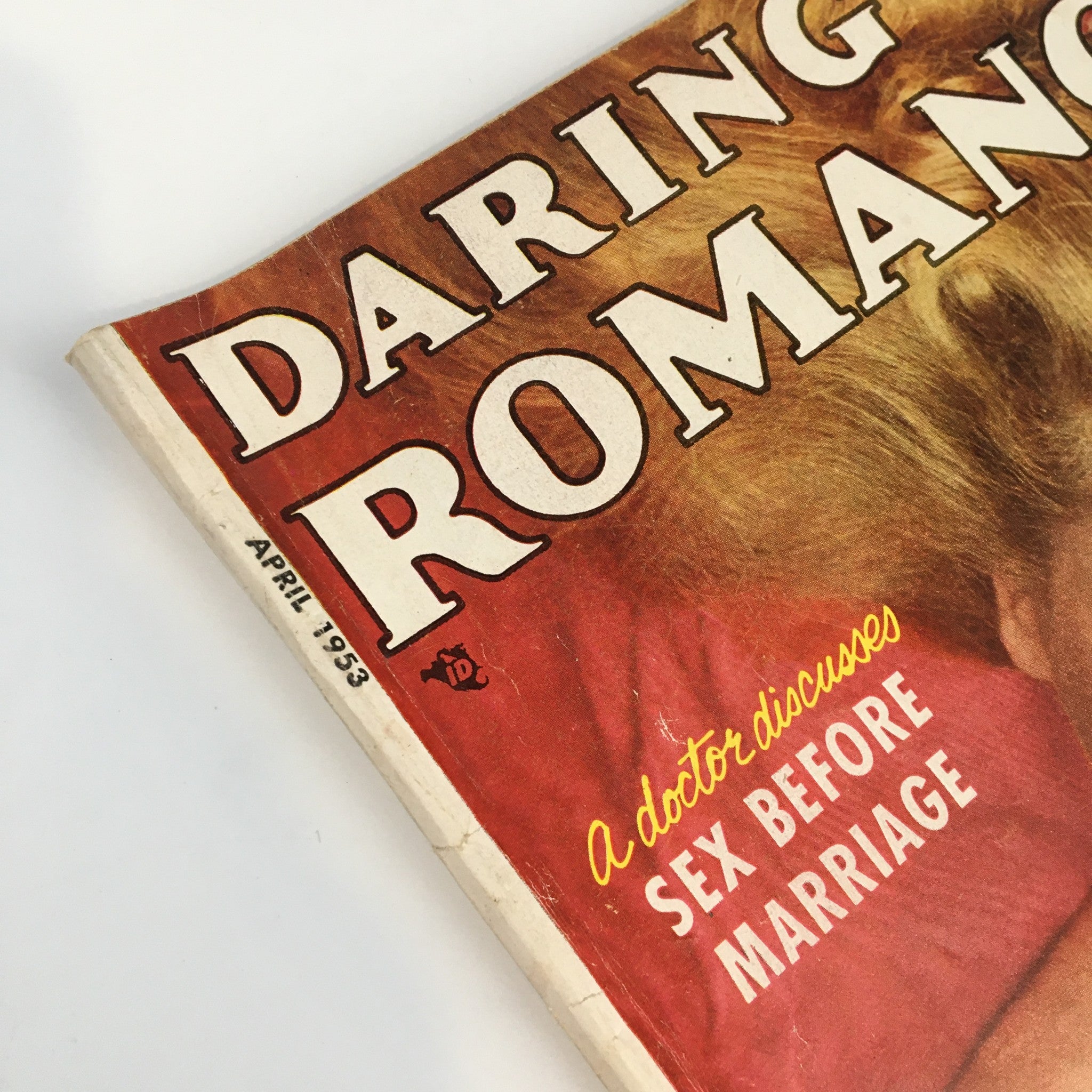 VTG Daring Romances Magazine April 1953 - Detail of magazine corner featuring title and date, emphasizing vintage appeal and historical context.