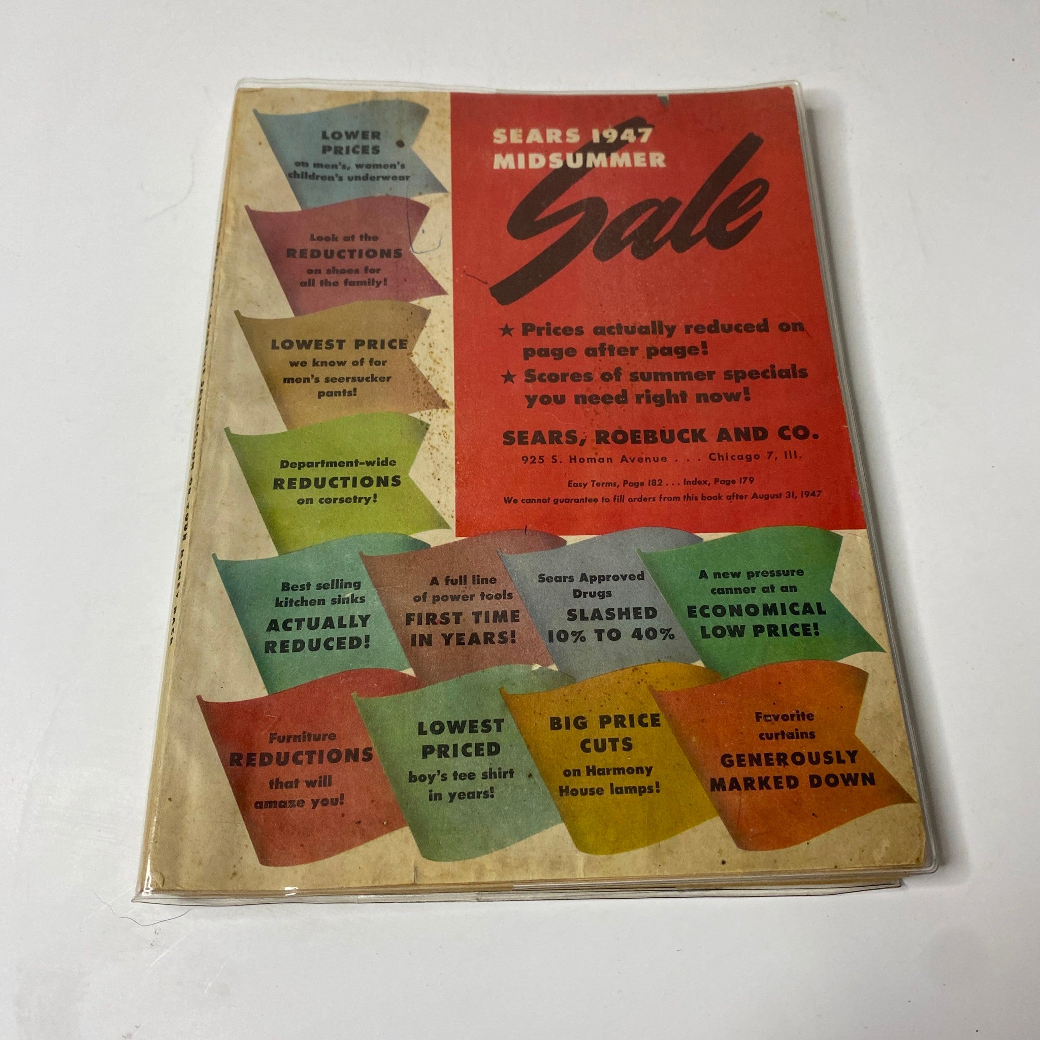 Cover of the 1947 Sears Midsummer Sale Catalog emphasizing attractive deals and discounts, featuring colorful banners that highlight offers on various household items.