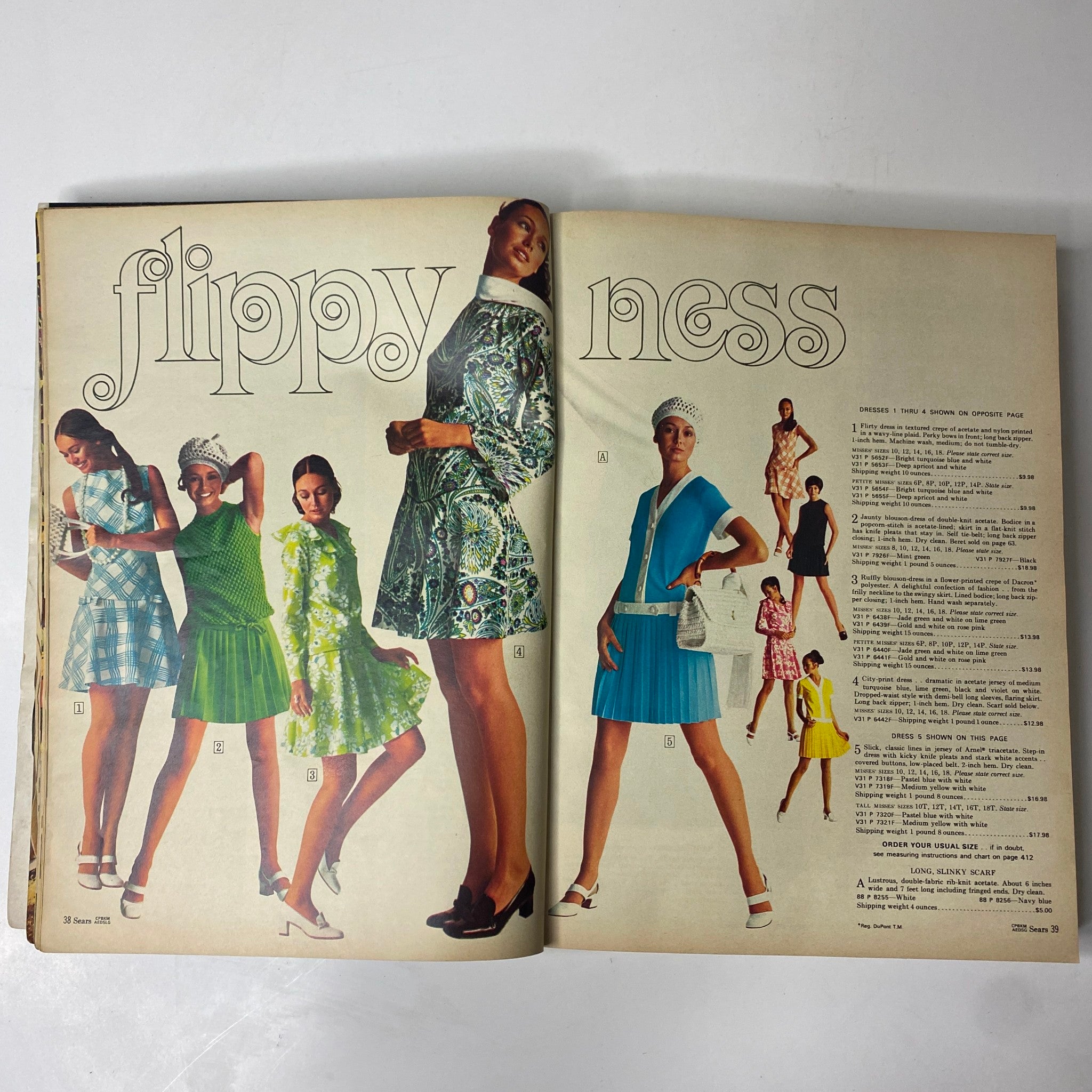 Fashion pages from the 1970 Sears, Roebuck and Co. Spring and Summer Catalog featuring models in vibrant dresses, illustrating popular styles of the 1970s.
