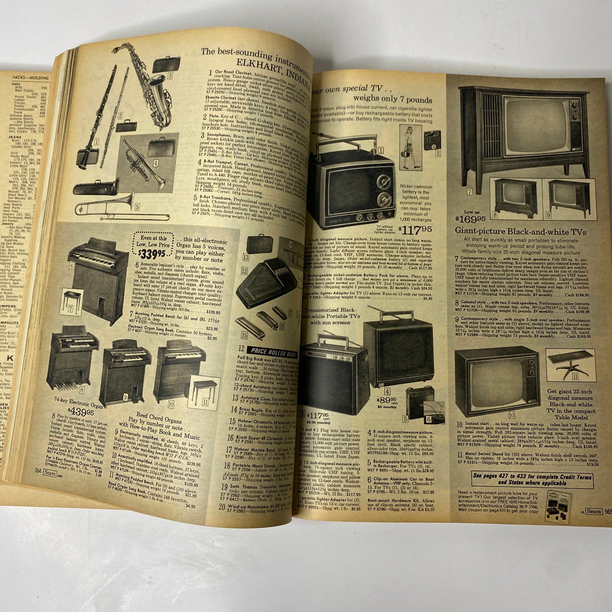 Page from the 1970 Sears, Roebuck and Co. Spring and Summer Catalog displaying various electronic instruments and televisions available for purchase.