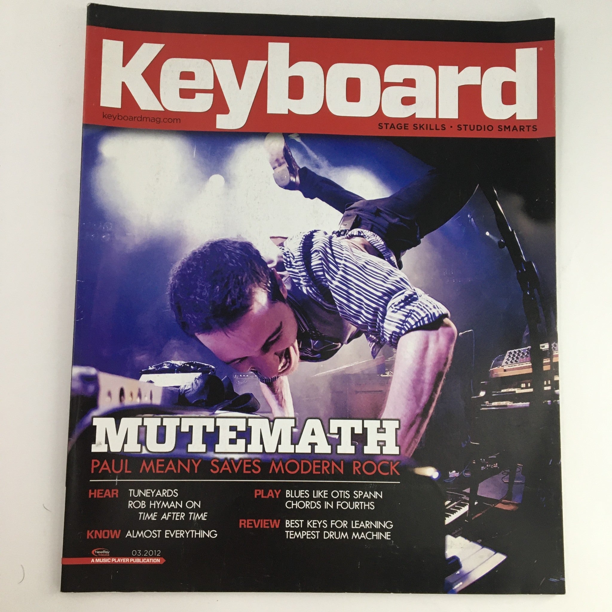 Cover of Keyboard Magazine March 2012 featuring Mutemath's Paul Meany and Tuneyards' Rob Hyman, showcasing elements of music technology and modern rock.