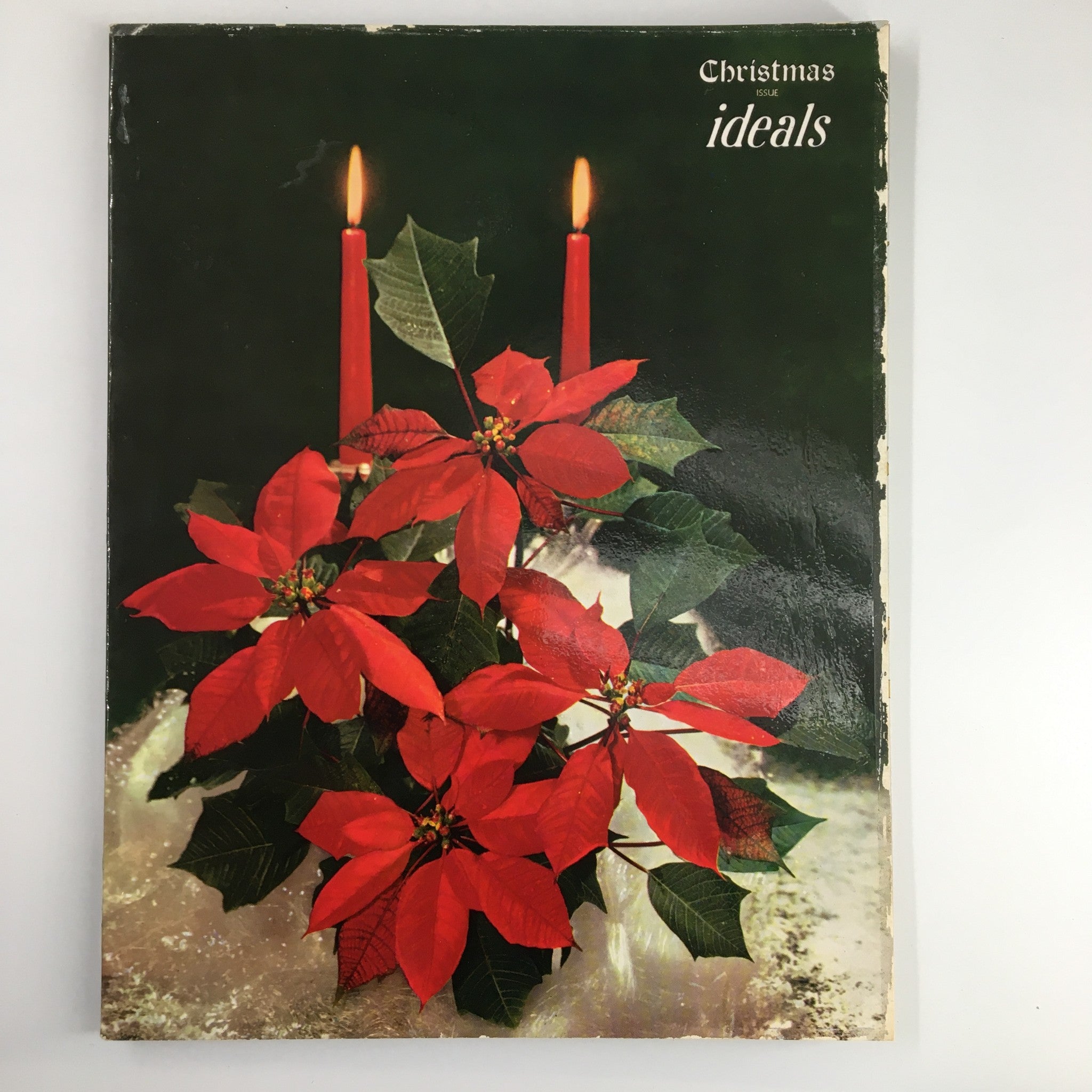 Cover of Ideals Vol. 17 No. 4 October 1960 Christmas Issue featuring vibrant red poinsettias and candles, capturing the festive spirit of Christmas.