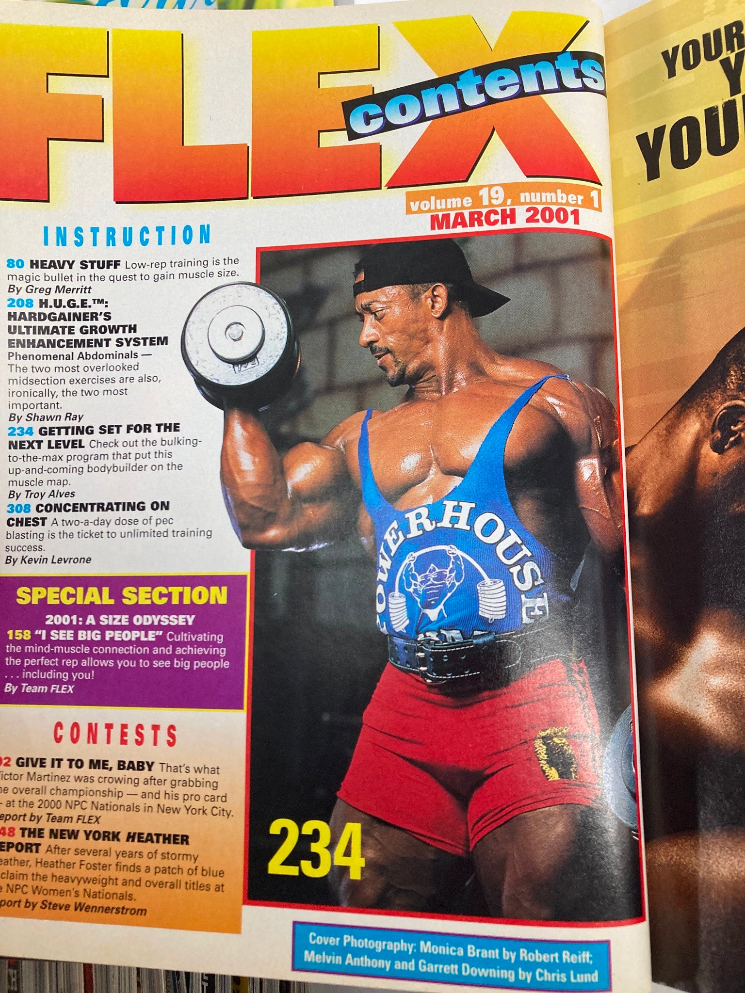 Inside page of Flex Magazine March 2001 Vol 19 #1 showcasing a male bodybuilder lifting weights, illustrating key fitness content and training tips.