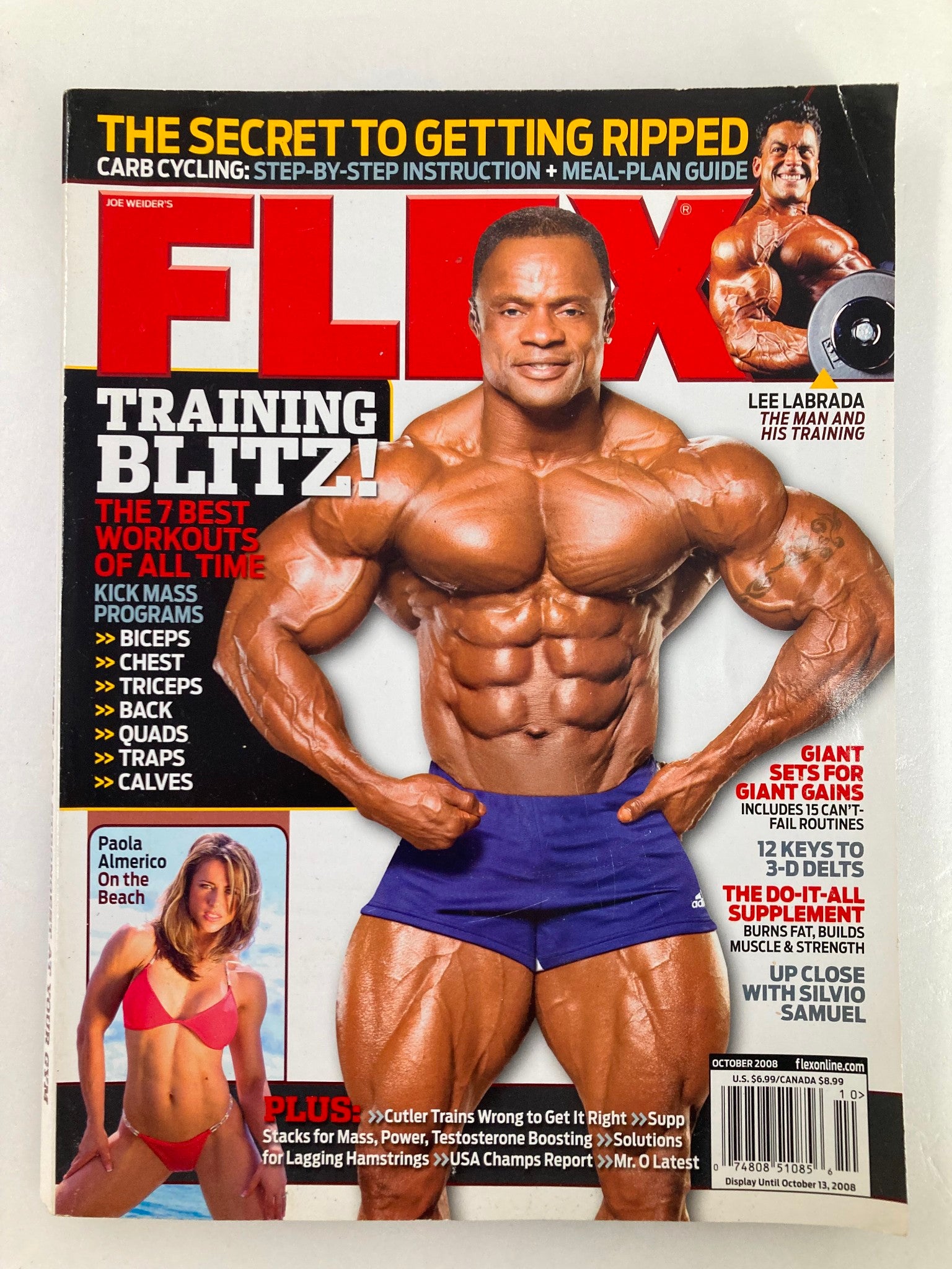 Cover of Flex Magazine, October 2008 issue featuring bodybuilding star Lee Labrada, highlighted for a training guide. It also showcases fitness models Paola Almerico and Silvio Samuel, emphasizing bodybuilding workouts, nutrition tips, and cultural trends in fitness.