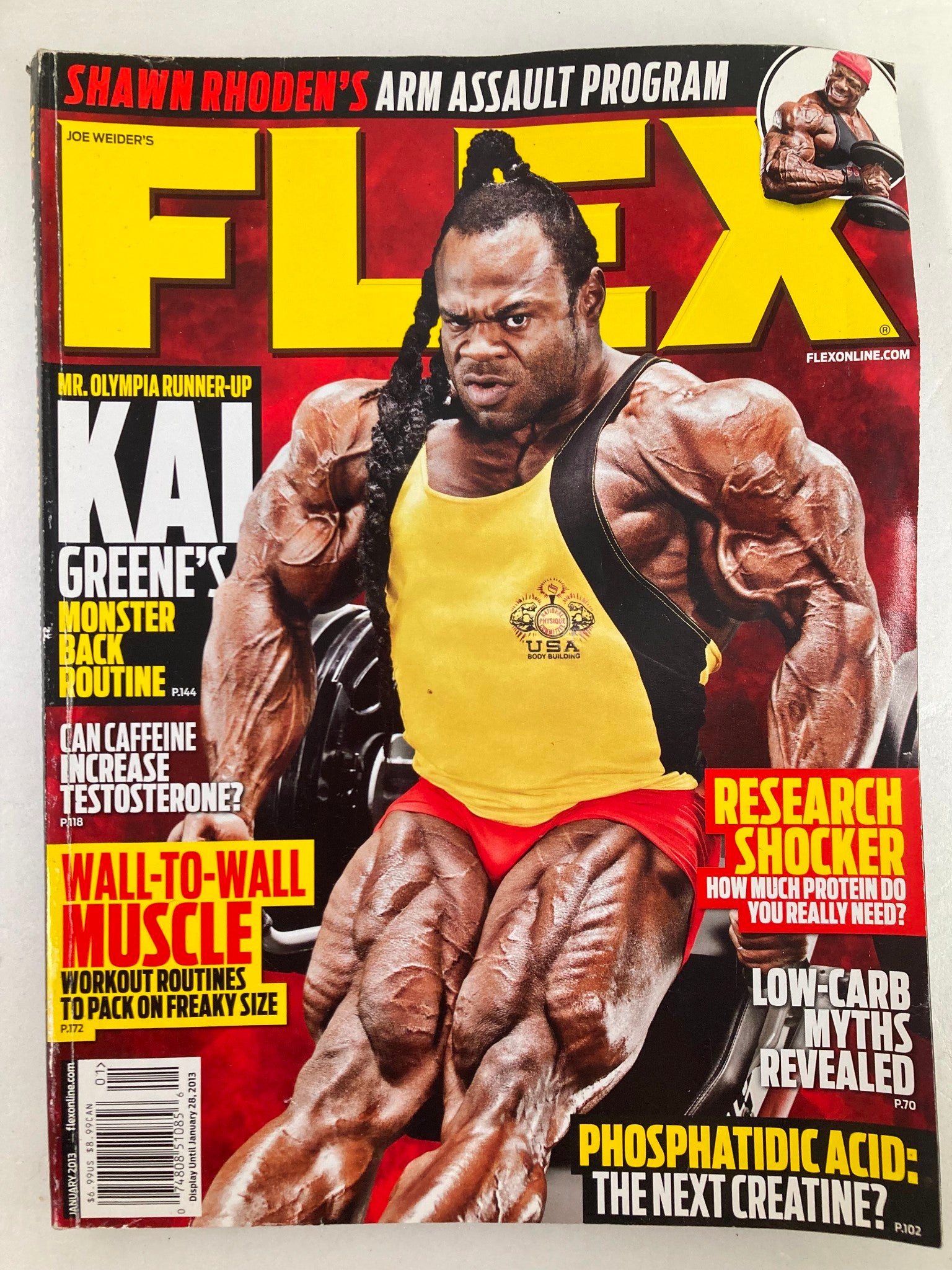 Flex Magazine January 2013 featuring Kai Greene on the cover, showcasing his muscular physique and promoting Shawn Rhoden's Arm Assault Program. The magazine includes fitness strategies and workout routines for strength training.