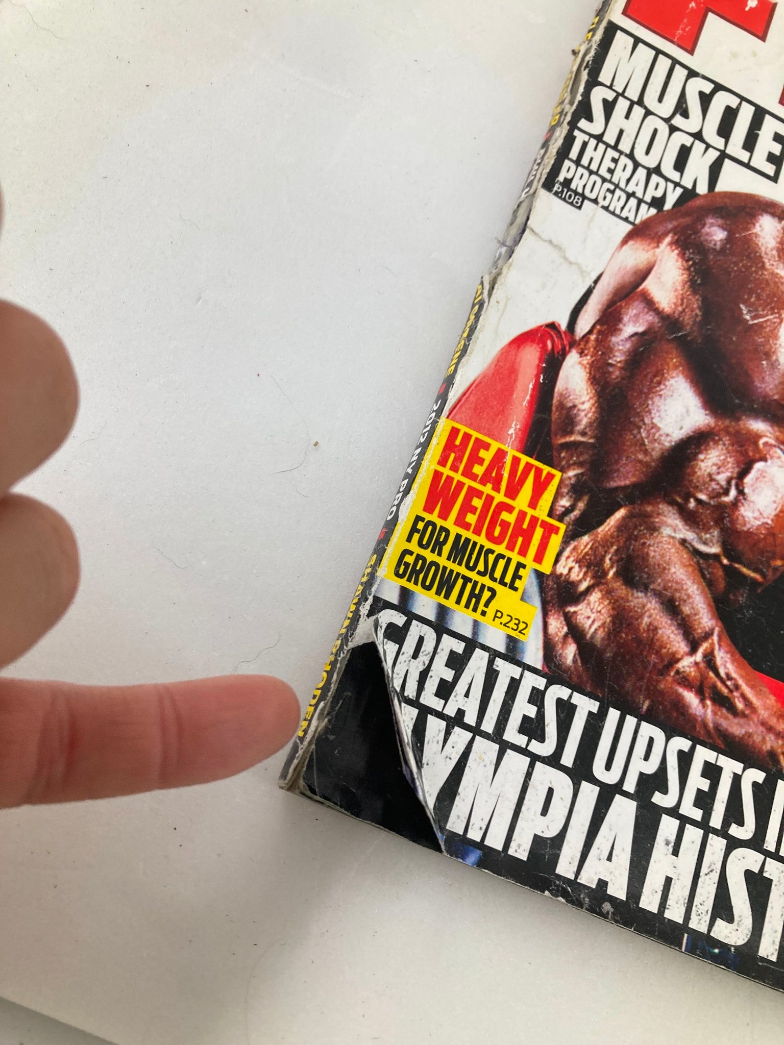 Cover of Flex Magazine August 2012 featuring a muscular athlete, highlighting the topic 'Heavy Weight for Muscle Growth'.