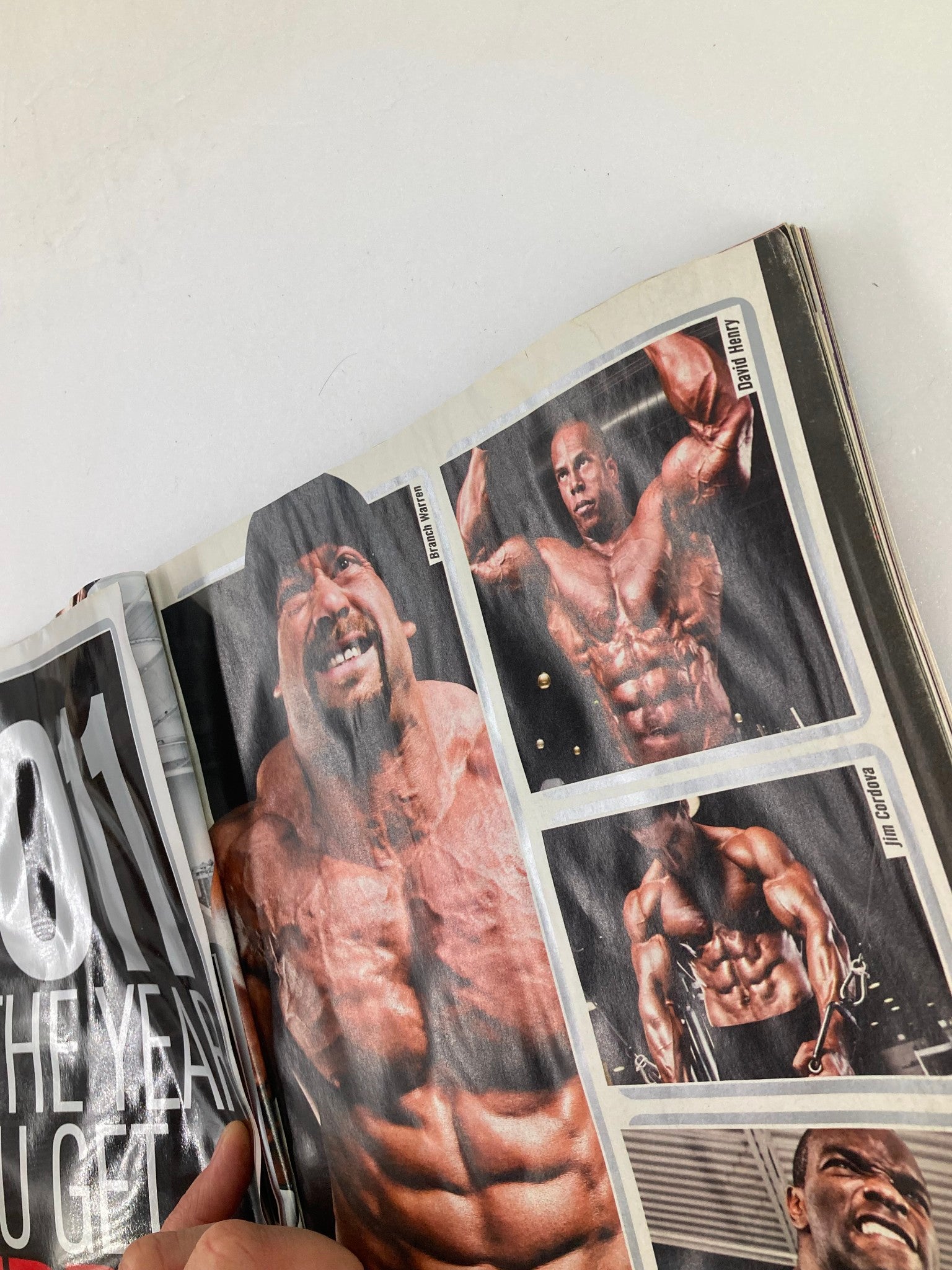Inside pages of Flex Magazine January 2011 showcasing bodybuilders and workout routines.